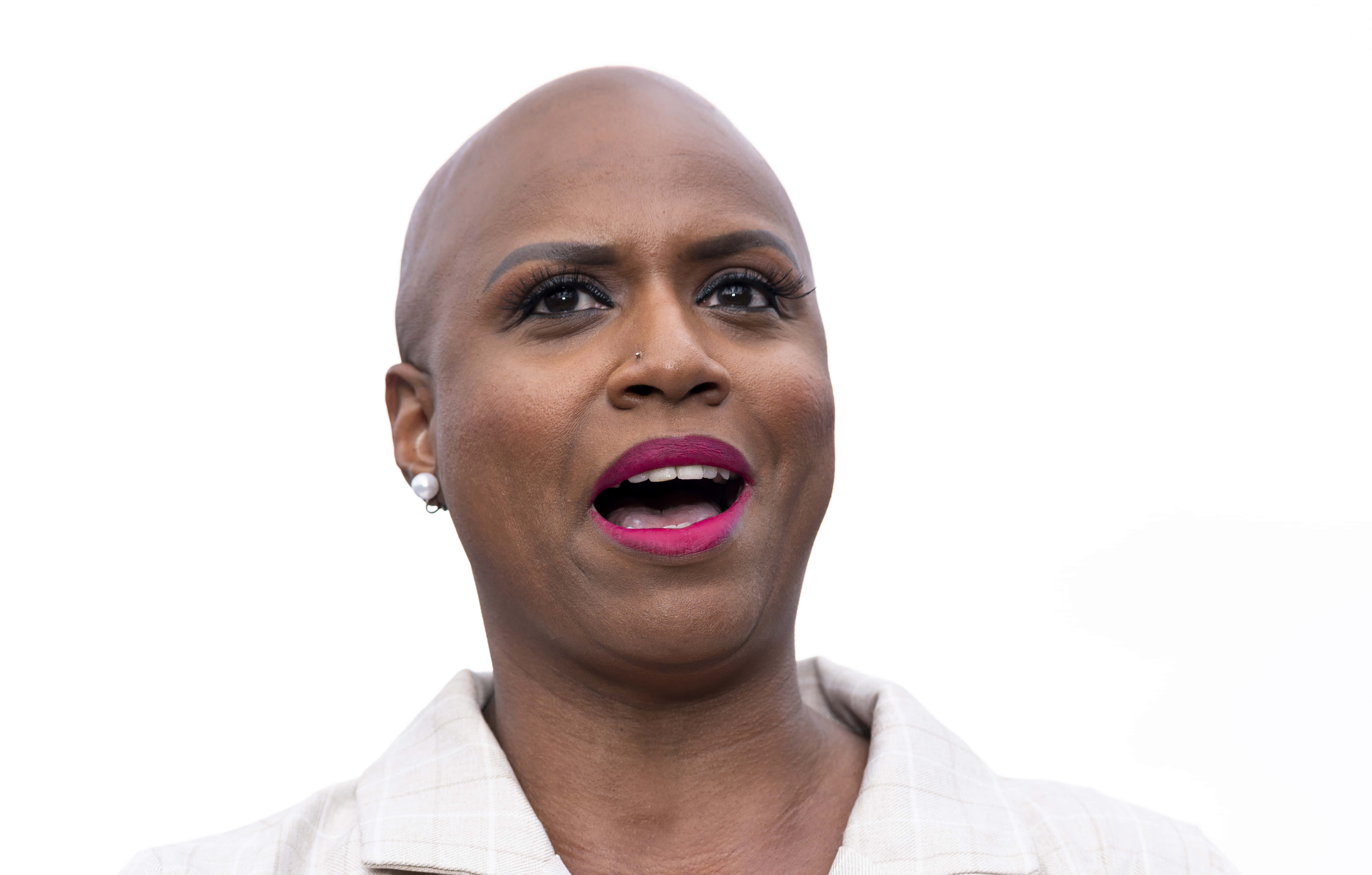 Ayanna Pressley, bald Black woman, bold pink lipstick, 5K Desktop Wallpaper