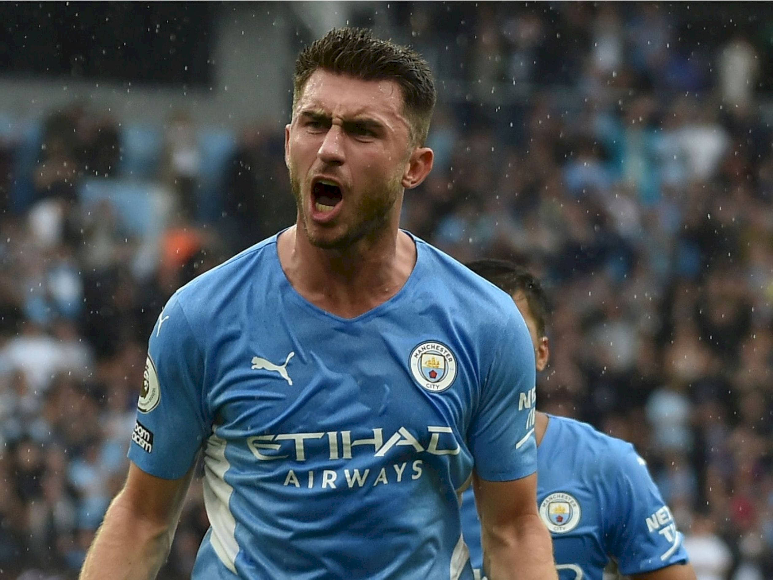 Aymeric Laporte, blue Manchester City jersey, rainy match, Full HD Desktop Wallpaper