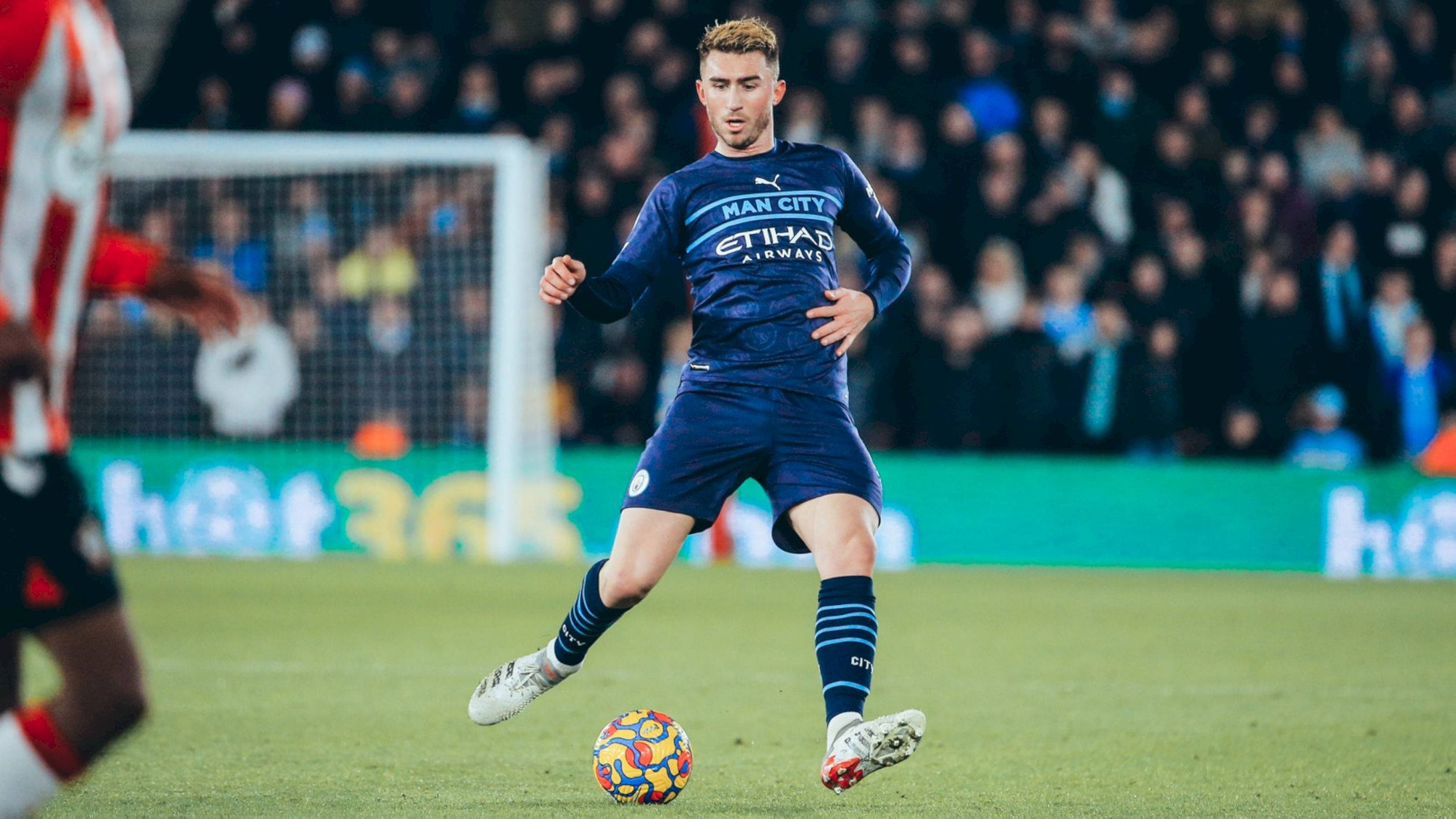Aymeric Laporte, blue Manchester City jersey, colorful ball, Full HD Desktop Wallpaper