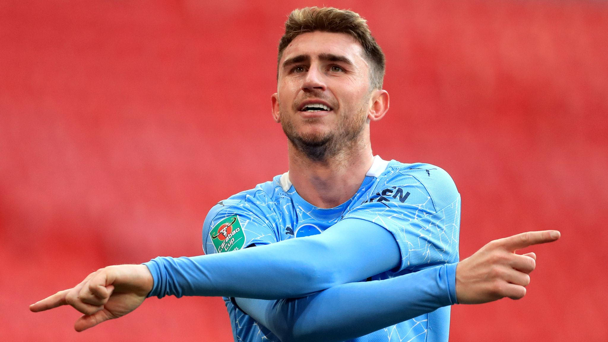 Aymeric Laporte, light blue jersey, vibrant red stadium background, Full HD Desktop Wallpaper