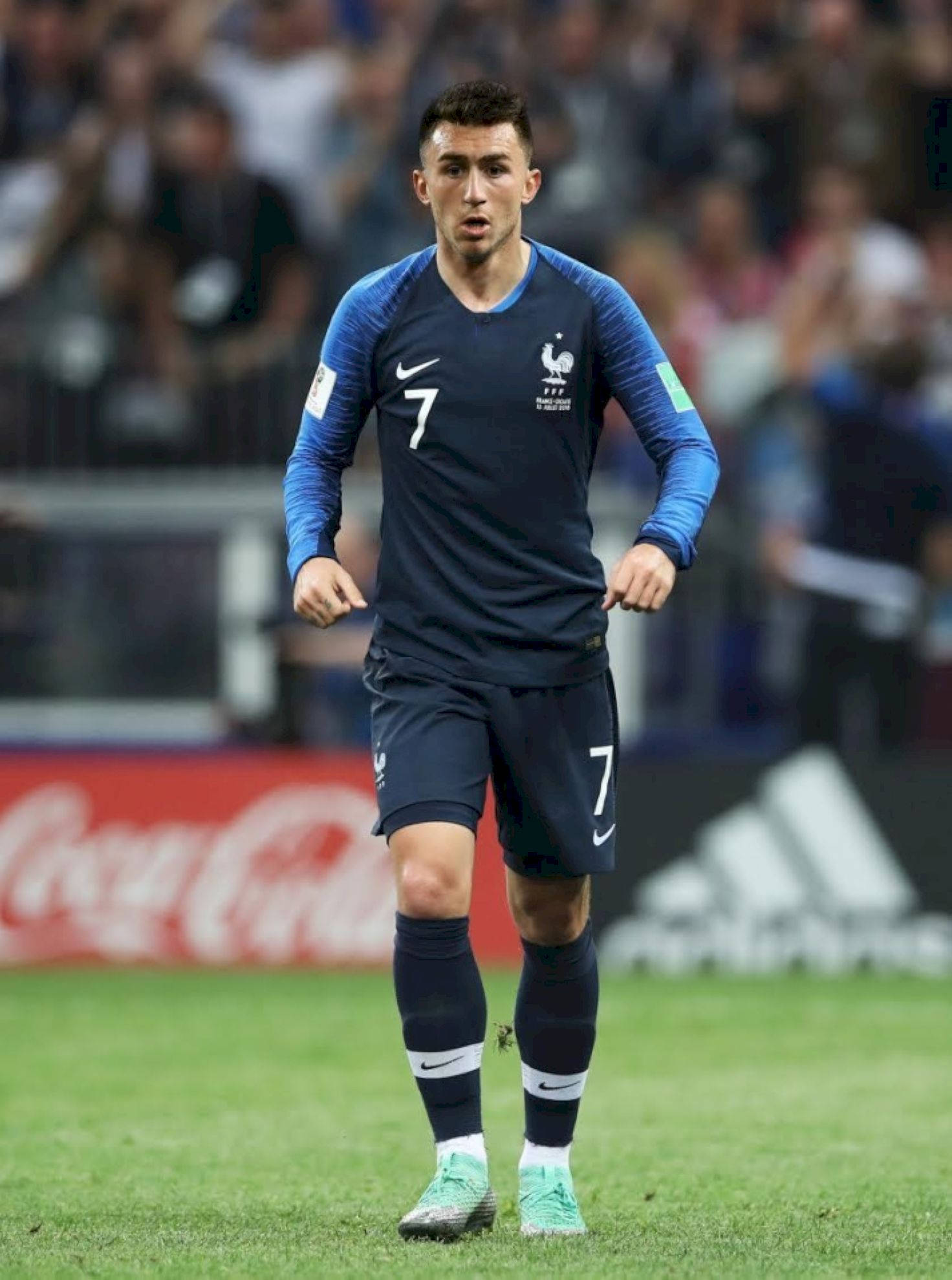 Aymeric Laporte, navy blue number 7 jersey, vibrant green pitch, Full HD Phone Wallpaper