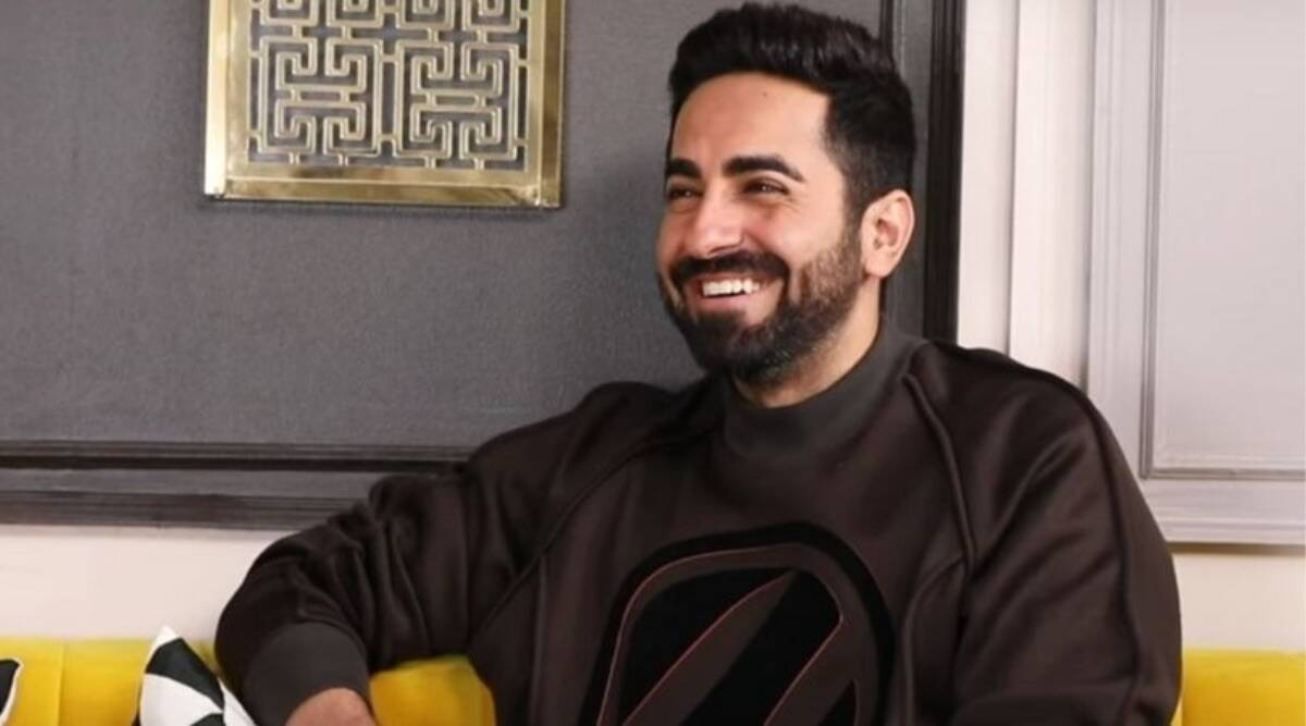 Ayushmann Khurrana, brown sweatshirt, bright yellow couch, SD Desktop Wallpaper