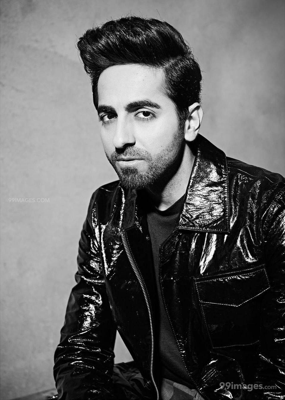 Ayushmann Khurrana, shiny black leather jacket, moody black-and-white studio portrait, HD Phone Wallpaper