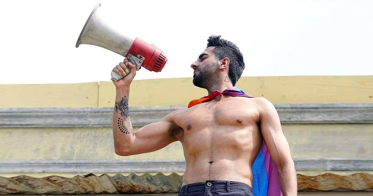 Ayushmann Khurrana, red megaphone, rainbow flag, SD Desktop Wallpaper