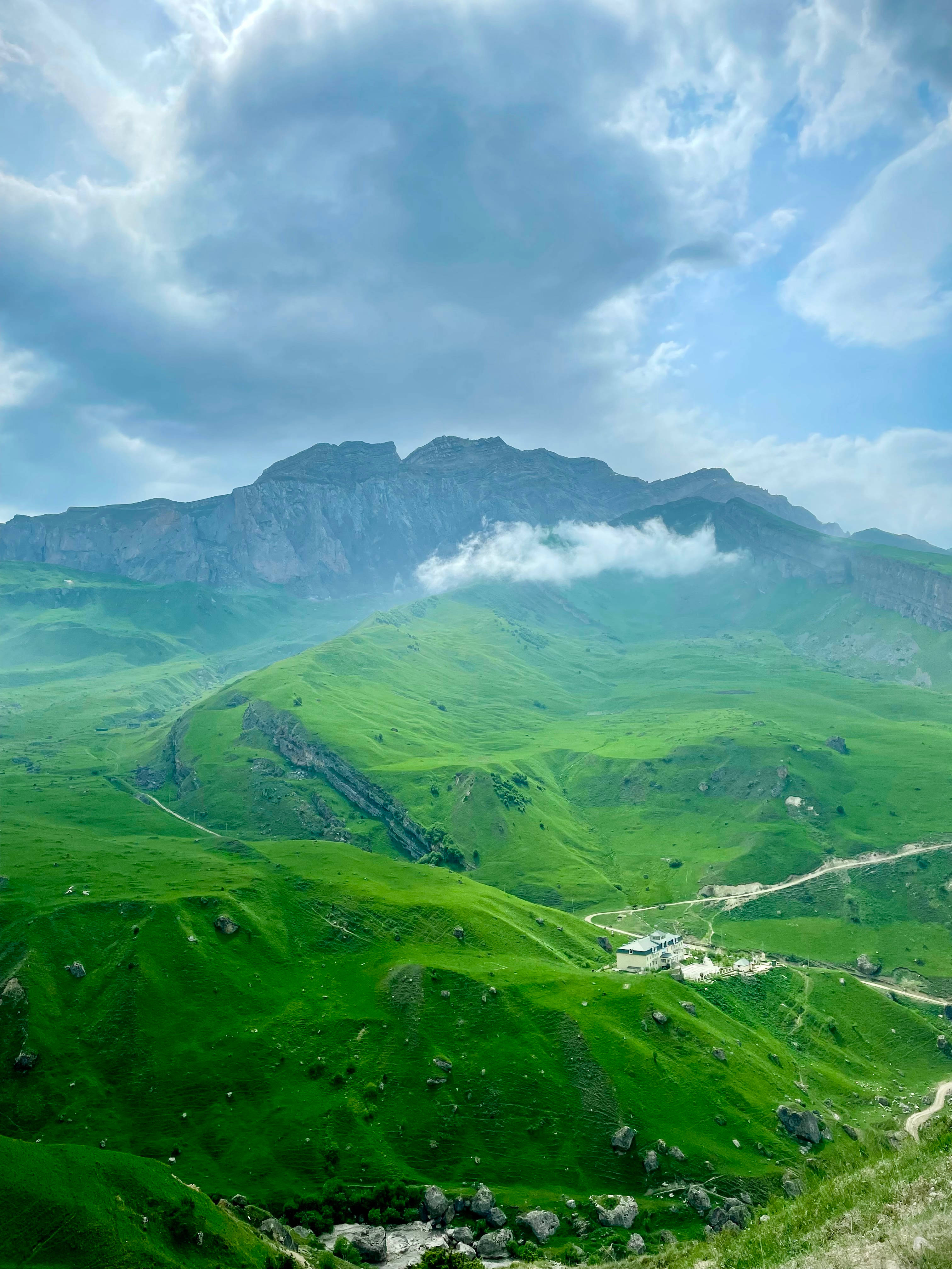 Azerbaijan, emerald green mountain valleys, dramatic cloudy sky, 4K Phone Wallpaper
