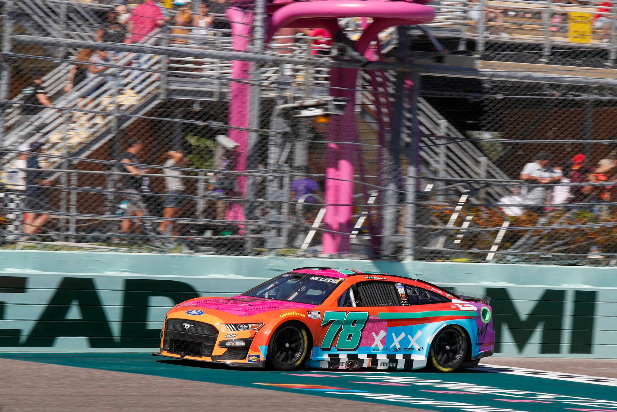 B.J. McLeod, pink NASCAR Cup car, orange and blue graphics, Full HD Desktop Wallpaper