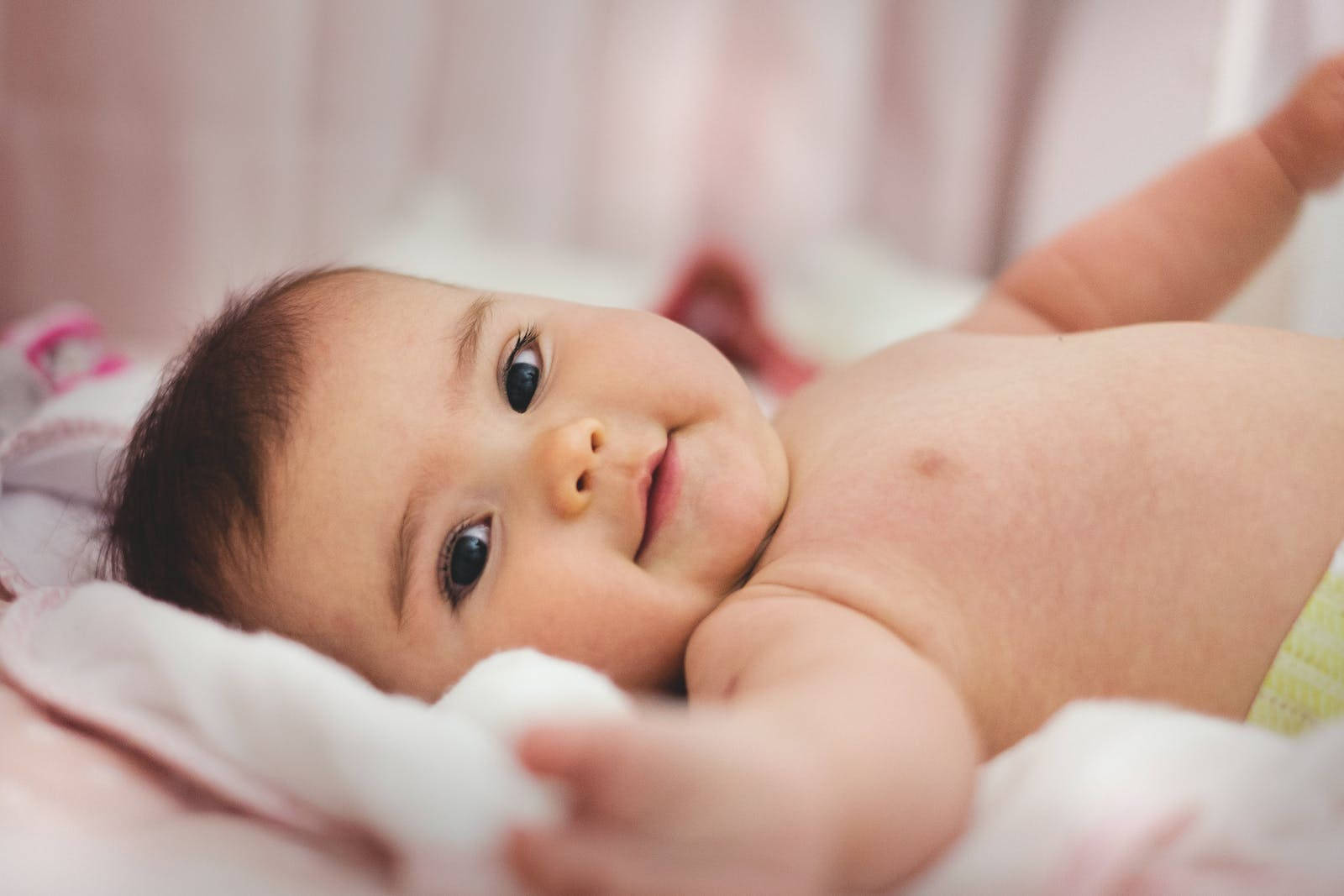 baby boy, soft pink blankets, curious dark eyes, HD Desktop Wallpaper