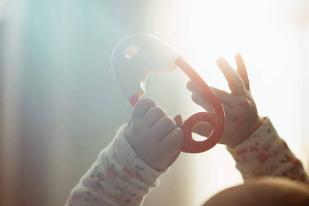 baby boy, red teether, glowing sunlit window, SD Desktop Wallpaper