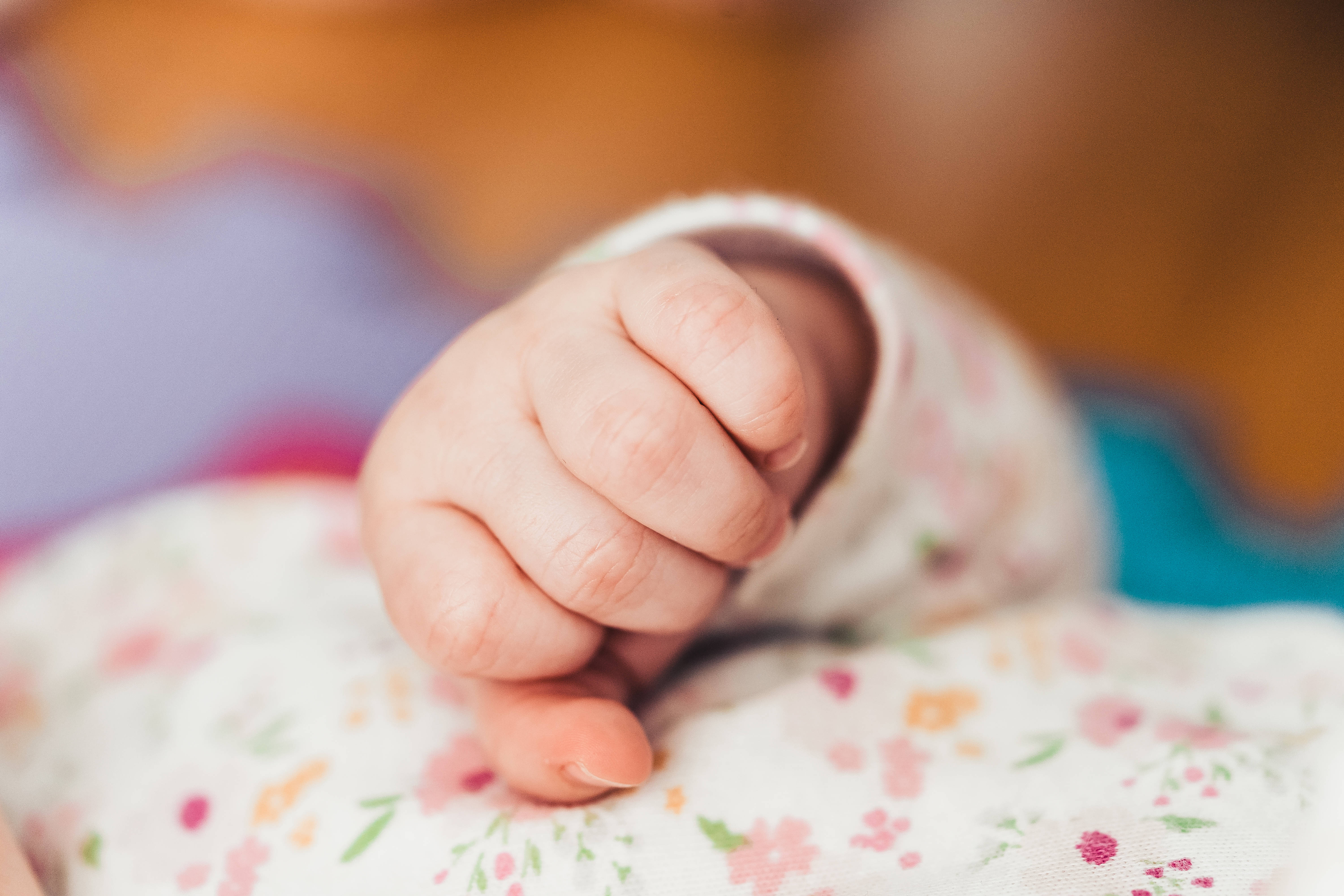 baby, clenched fist, soft floral blanket, 5K Desktop Wallpaper