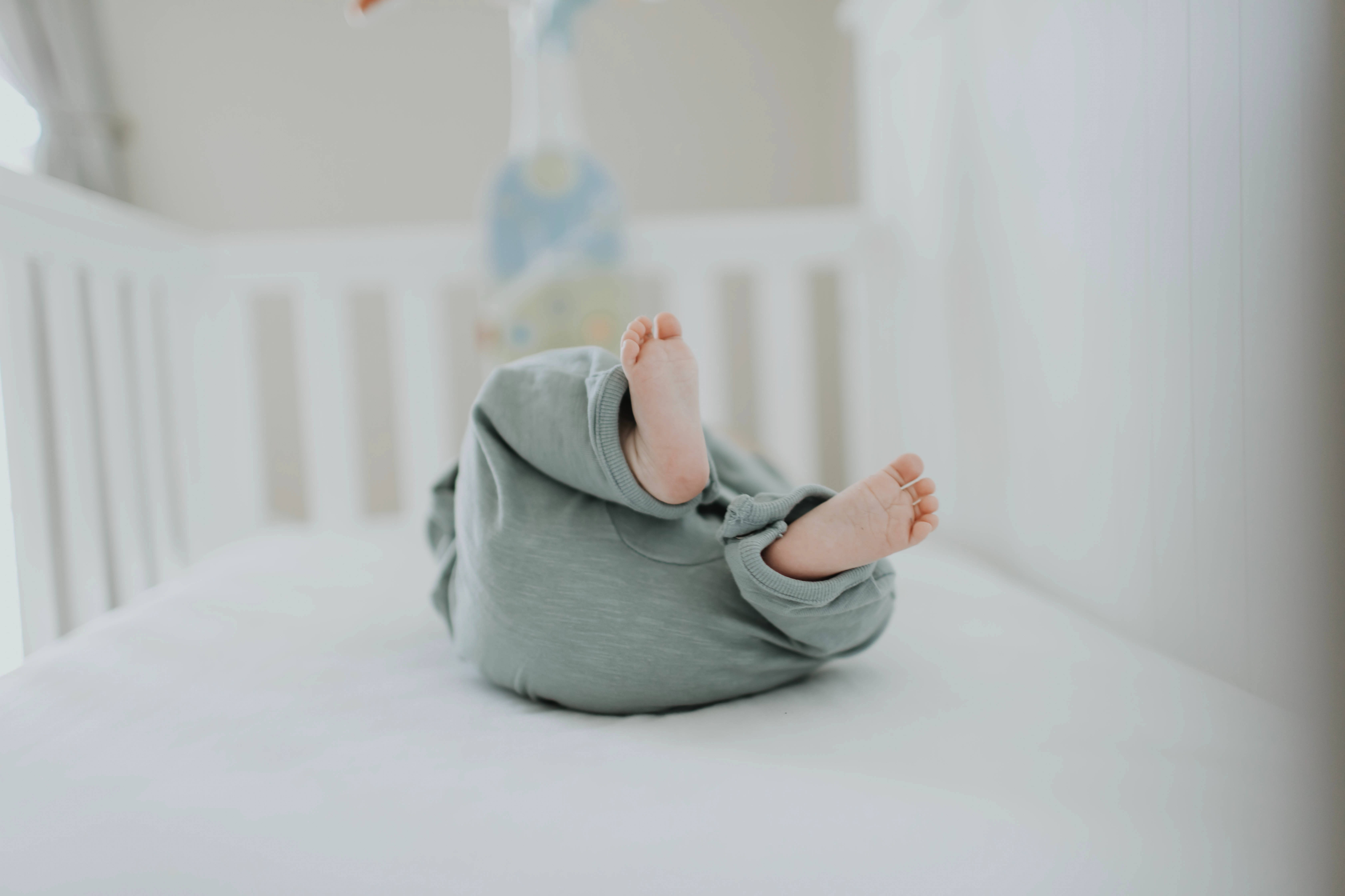 newborn baby, soft green pajamas, white crib, 5K Desktop Wallpaper