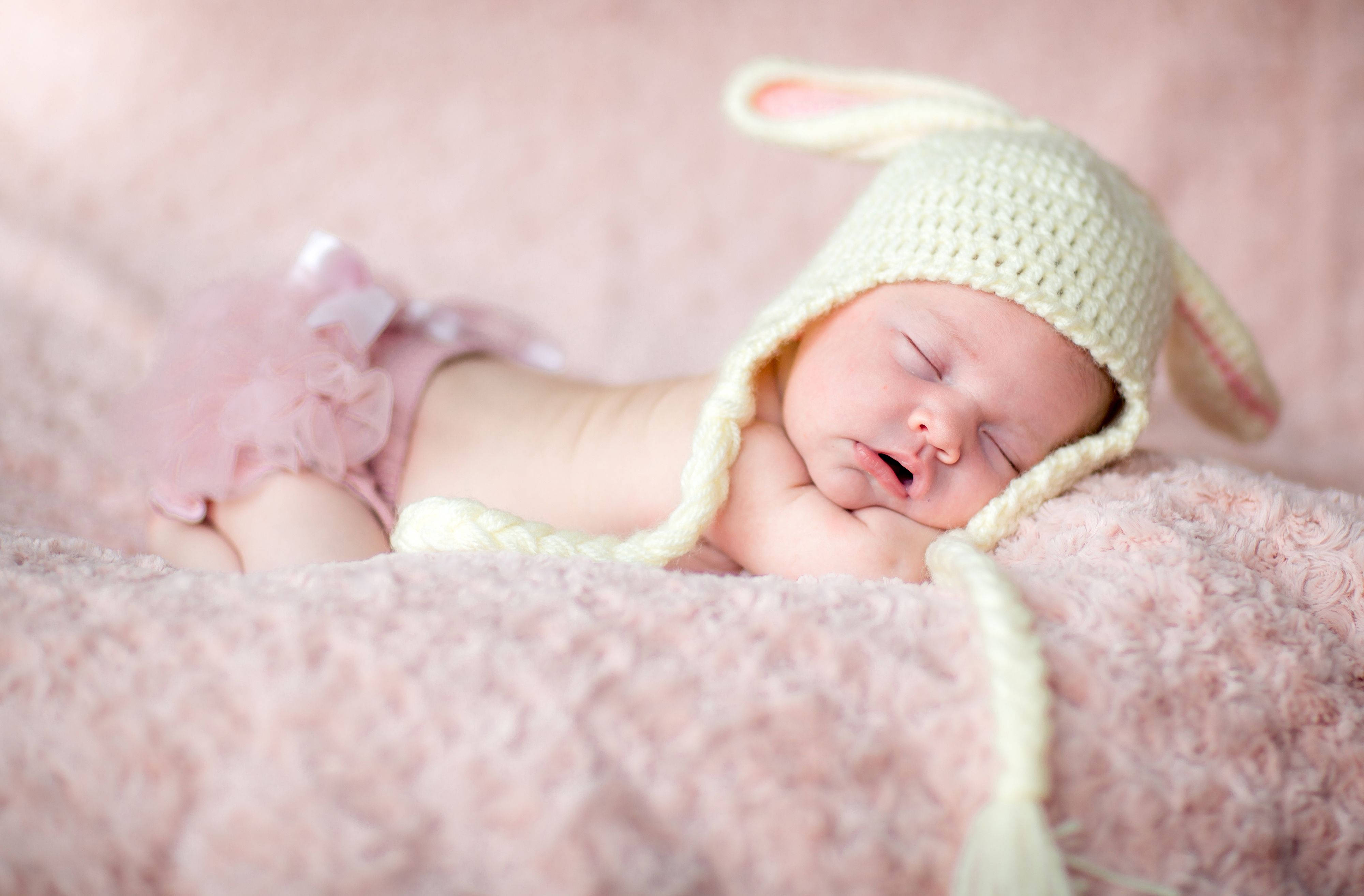newborn baby, cream crocheted bunny hat, pink ruffled diaper, 4K Desktop Wallpaper