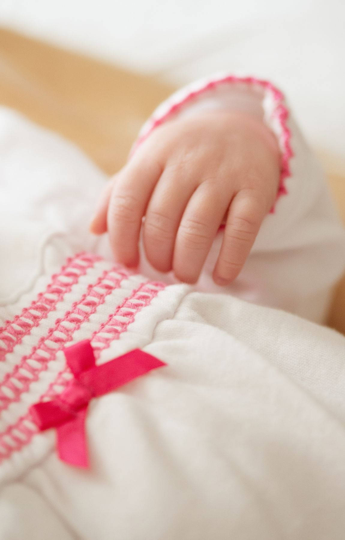 baby hand, white garment, pink smocking, HD Phone Wallpaper