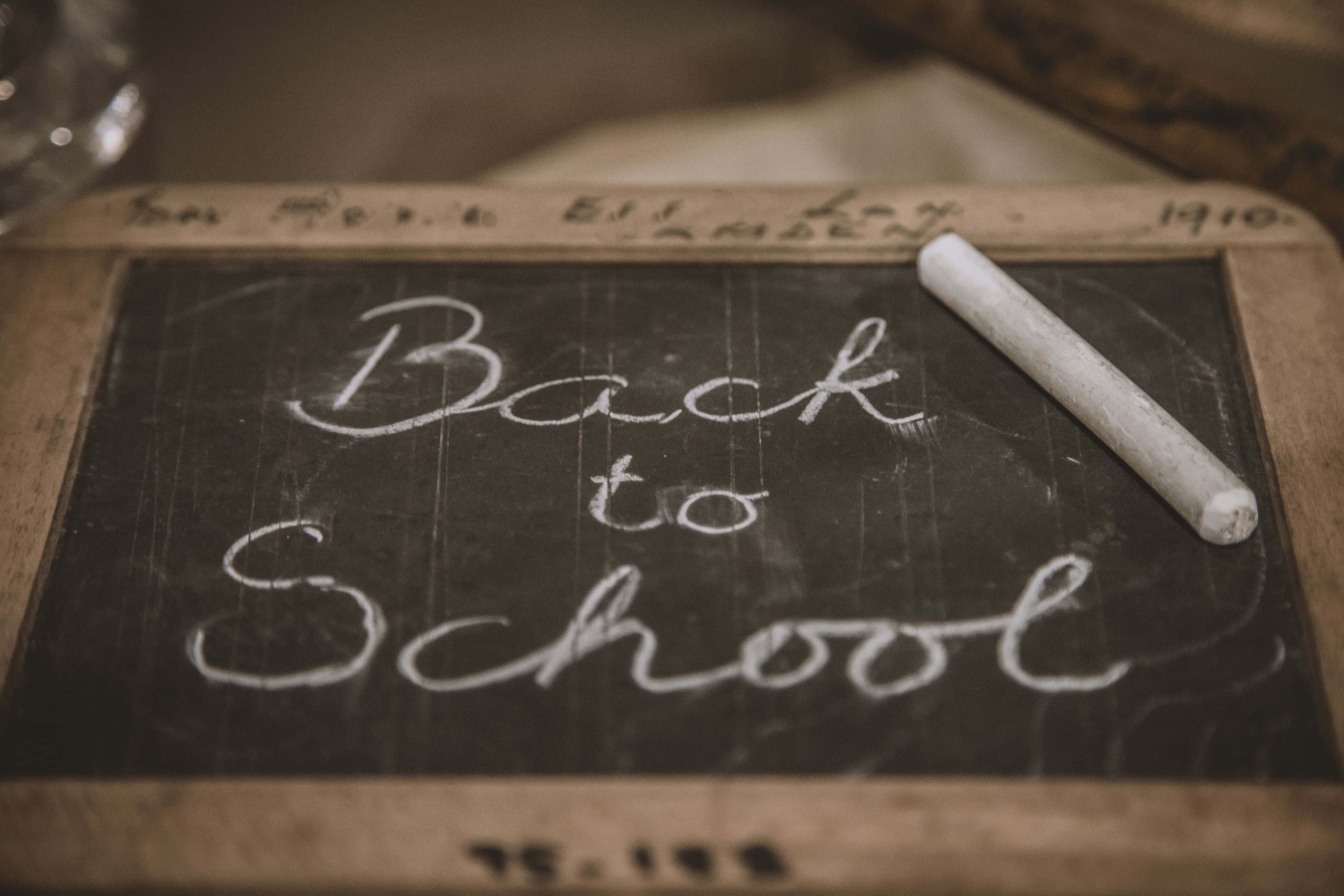 Back to School, vintage wooden-framed chalkboard, elegant white cursive, 4K Desktop Wallpaper