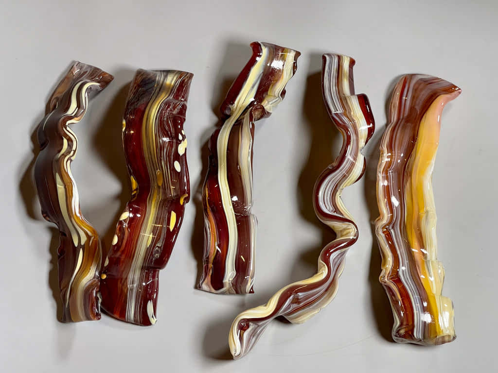 artistic bacon strips glass sculpture, glossy wavy agate sculptures, rich reds yellows and whites, SD Desktop Wallpaper