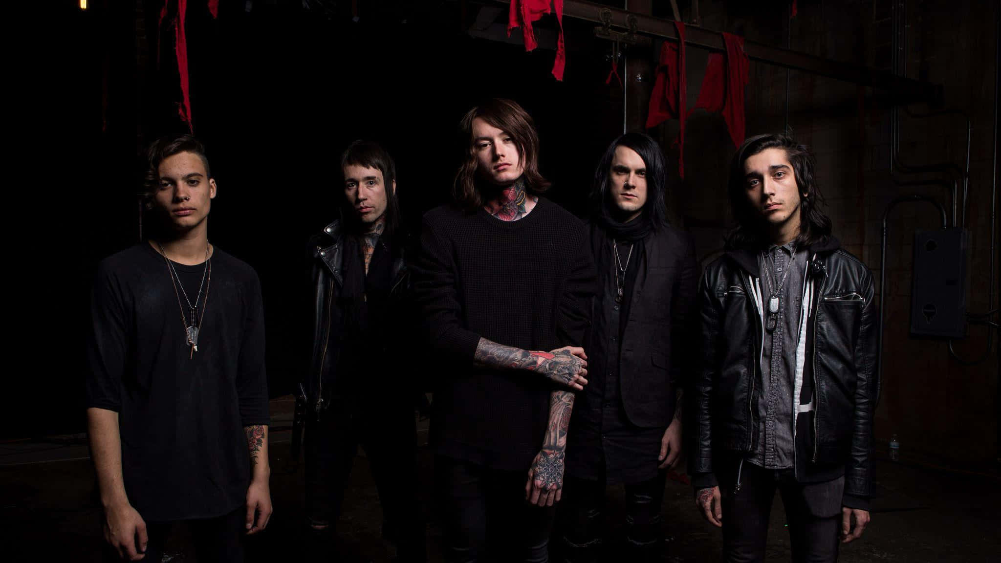 Bad Omens, dark clothing, dimly lit industrial space, Full HD Desktop Wallpaper