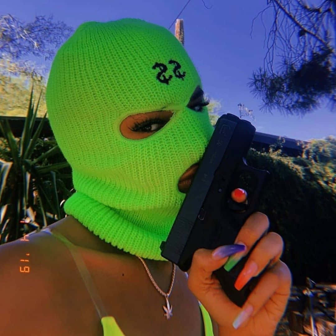 neon green knit balaclava, 22 embroidered, black handgun, SD Desktop Wallpaper