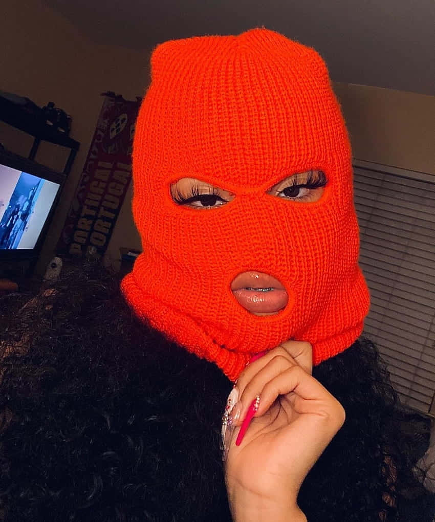 orange ski mask, bright orange knitted balaclava, dark curly hair, SD Phone Wallpaper