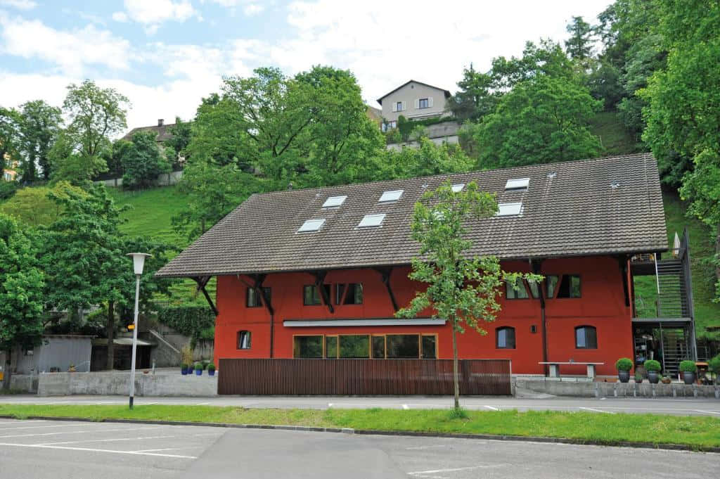 Baden, Switzerland, vibrant red modern house, brown tiled roof, SD Desktop Wallpaper