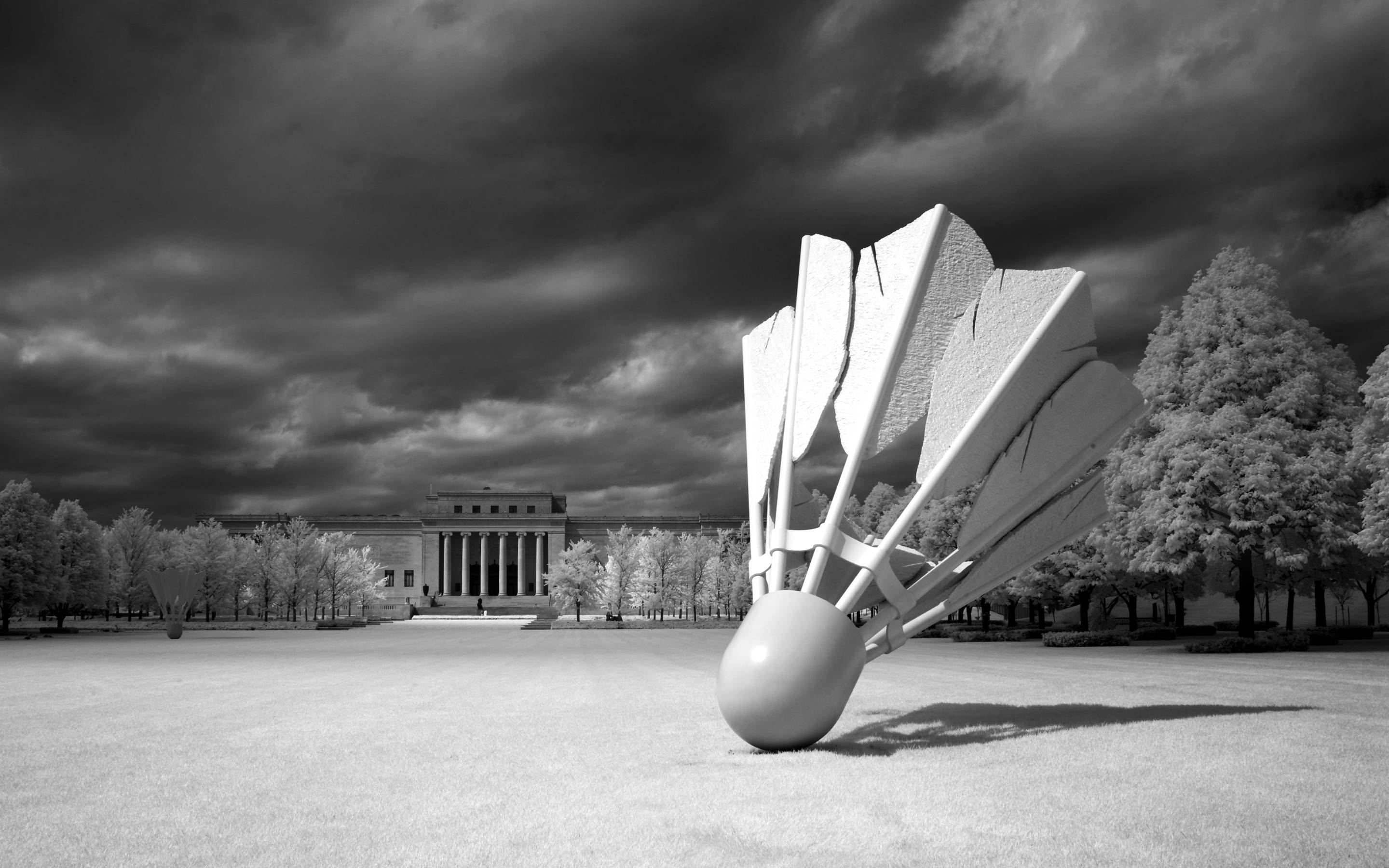 badminton shuttlecock sculpture, grassy field, classical building, 2K Desktop Wallpaper