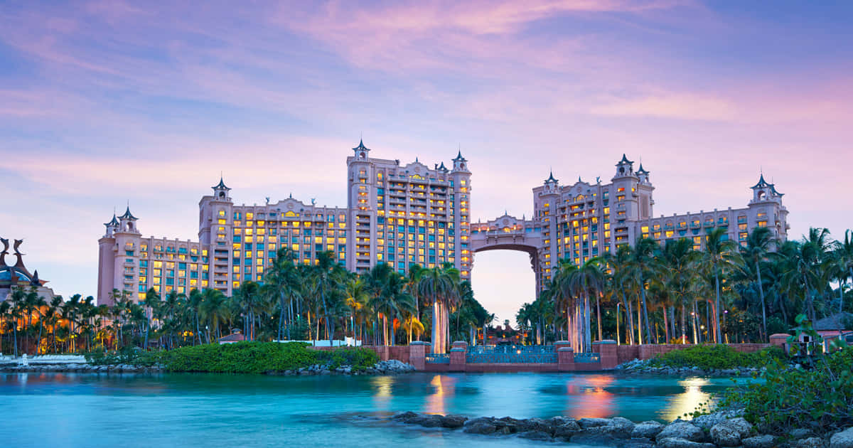 Bahamas Island, pink resort hotel, glowing windows, SD Desktop Wallpaper