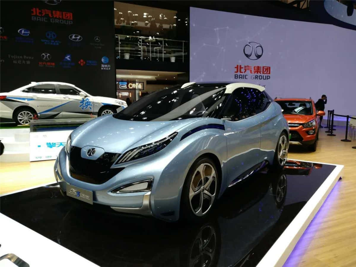 BAIC Group, sleek silver futuristic concept car, glossy black display platform, SD Desktop Wallpaper