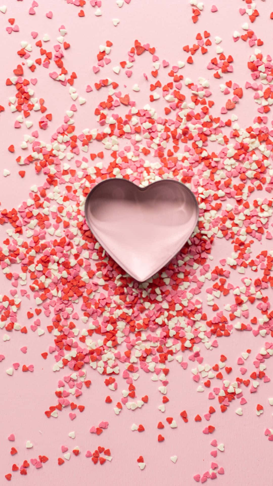 Baking iPhone, heart-shaped metallic dish, red pink and white heart-shaped sprinkles, Full HD Phone Wallpaper
