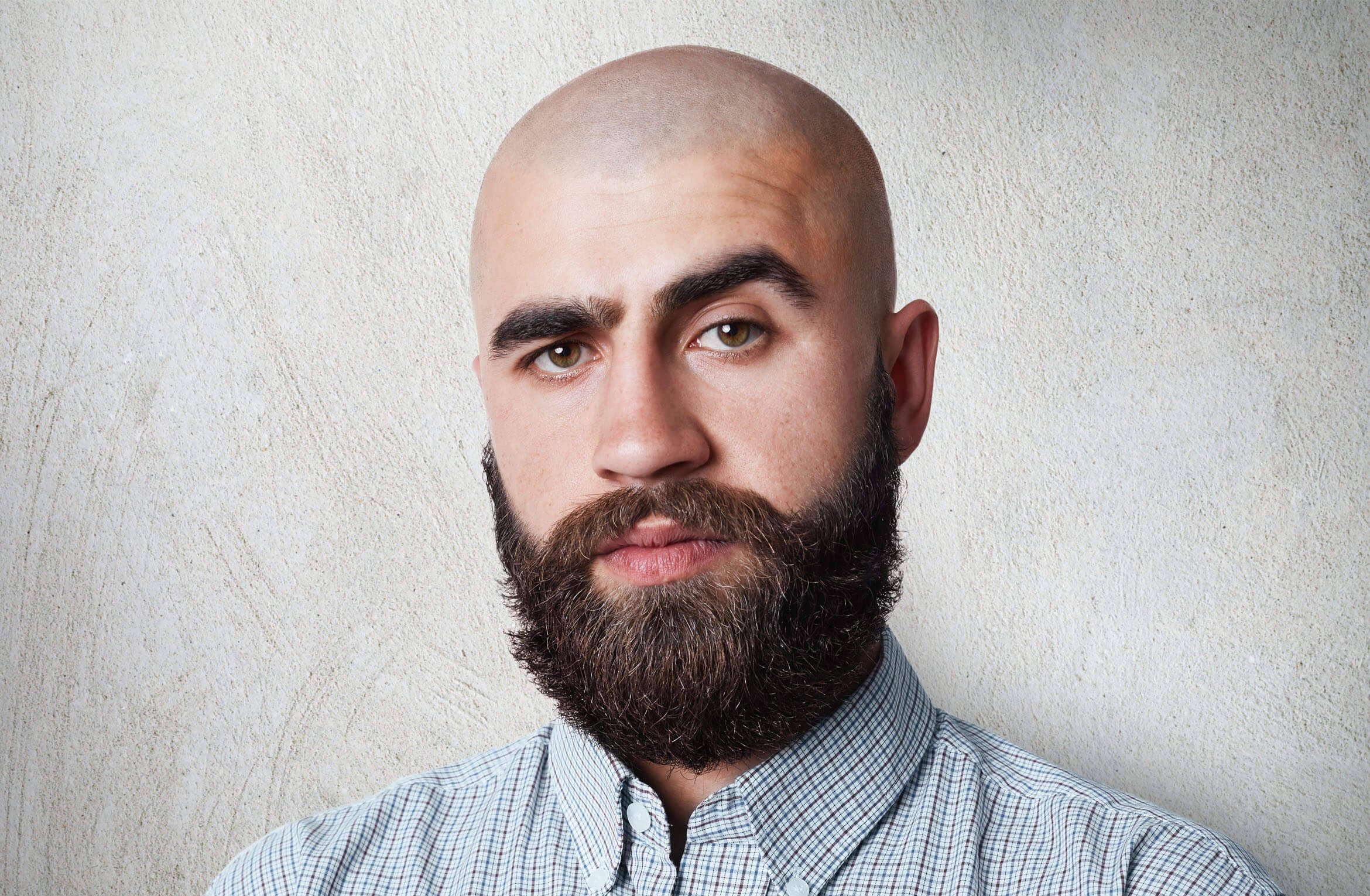 bald man, thick dark beard, textured off-white wall, Full HD Desktop Wallpaper
