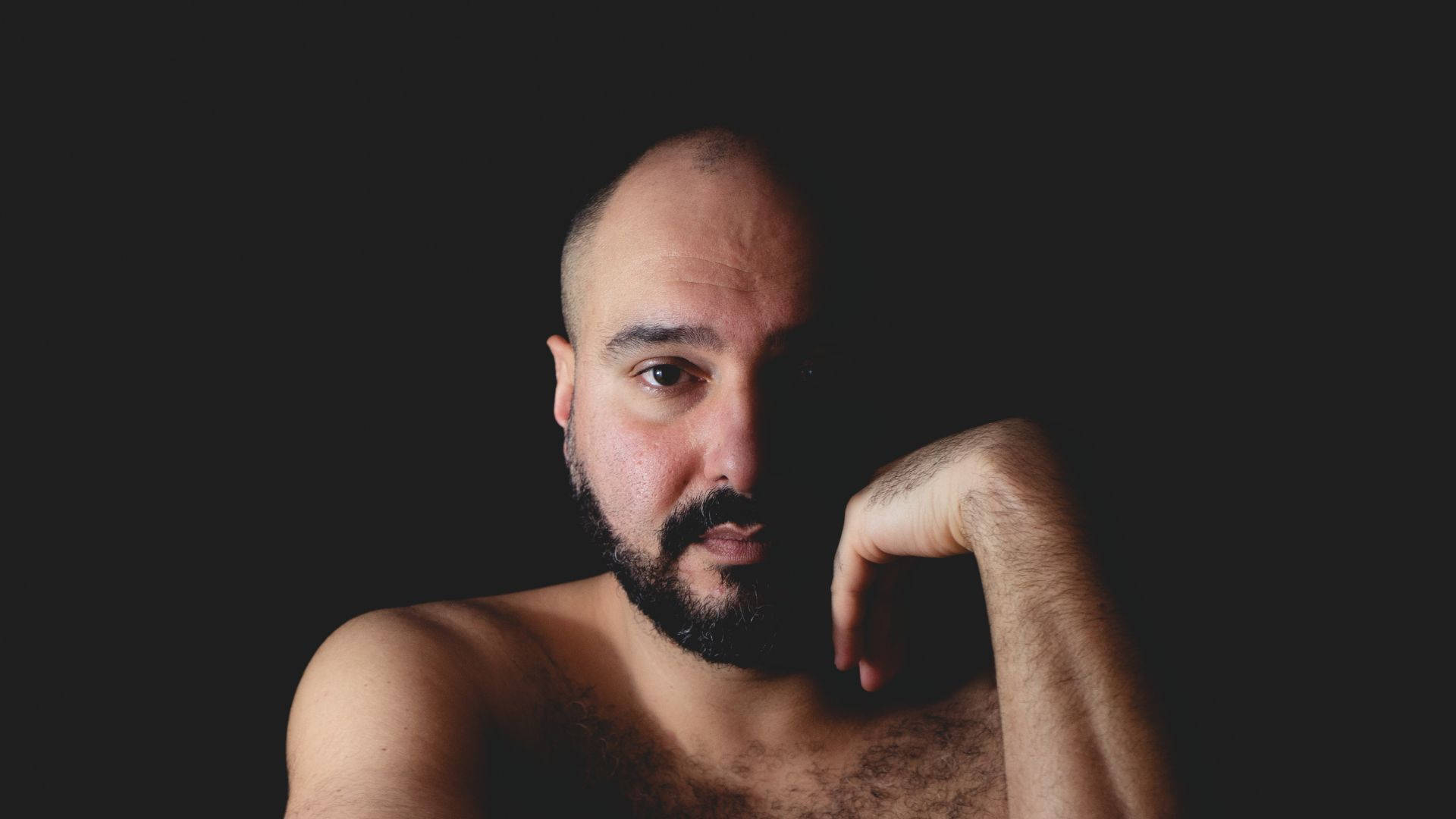 bald man, full black beard, stark black background, Full HD Desktop Wallpaper