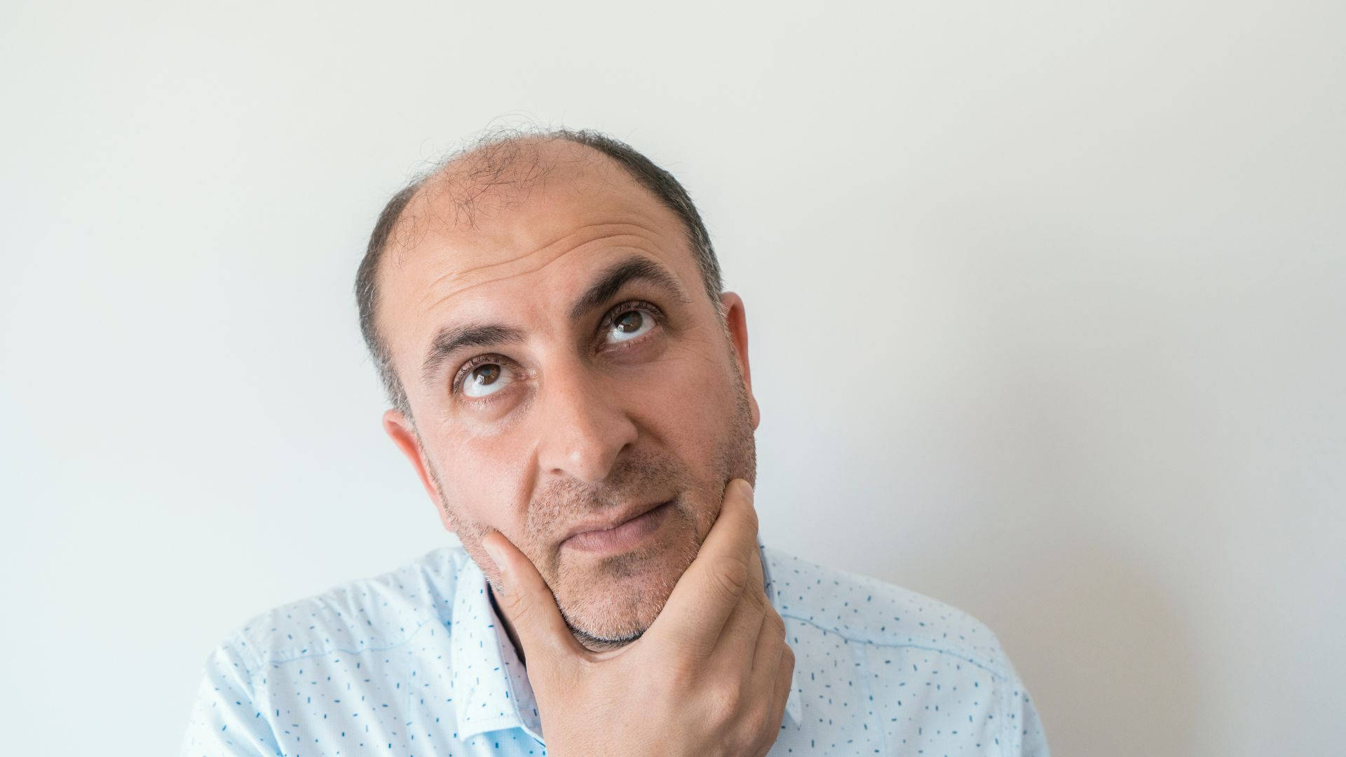 Bald Man, receding hairline, chin on hand, Full HD Desktop Wallpaper