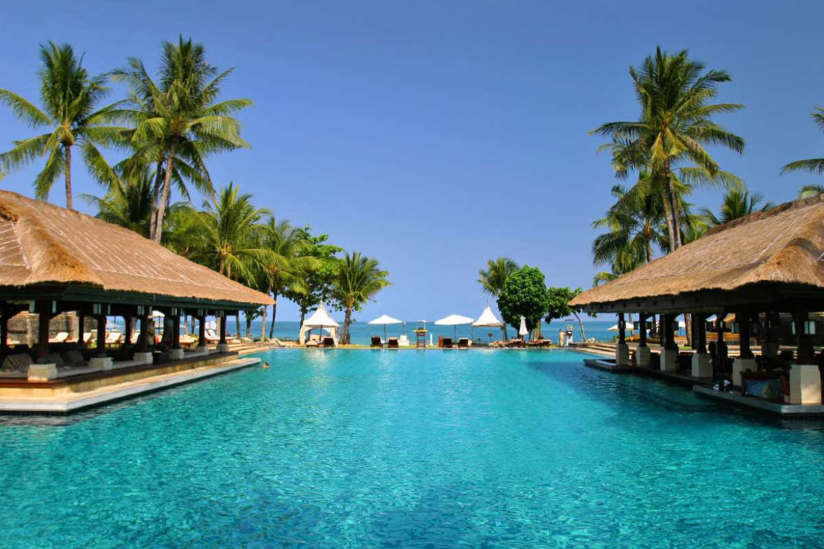 Bali Island, turquoise infinity pool, thatched-roof cabanas, SD Desktop Wallpaper