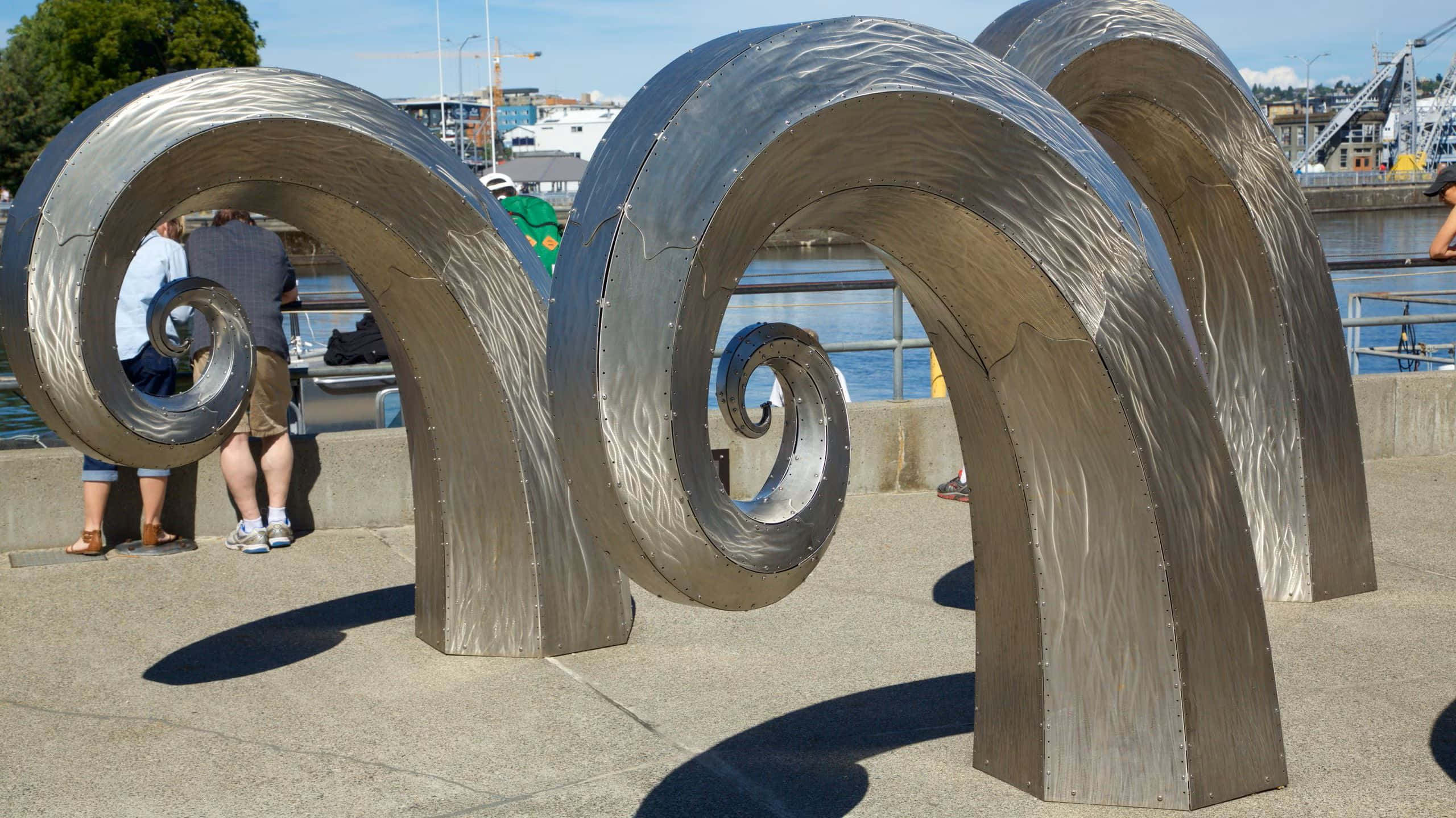 Ballard Locks, metal sculpture waves, sunlight, 2K Desktop Wallpaper