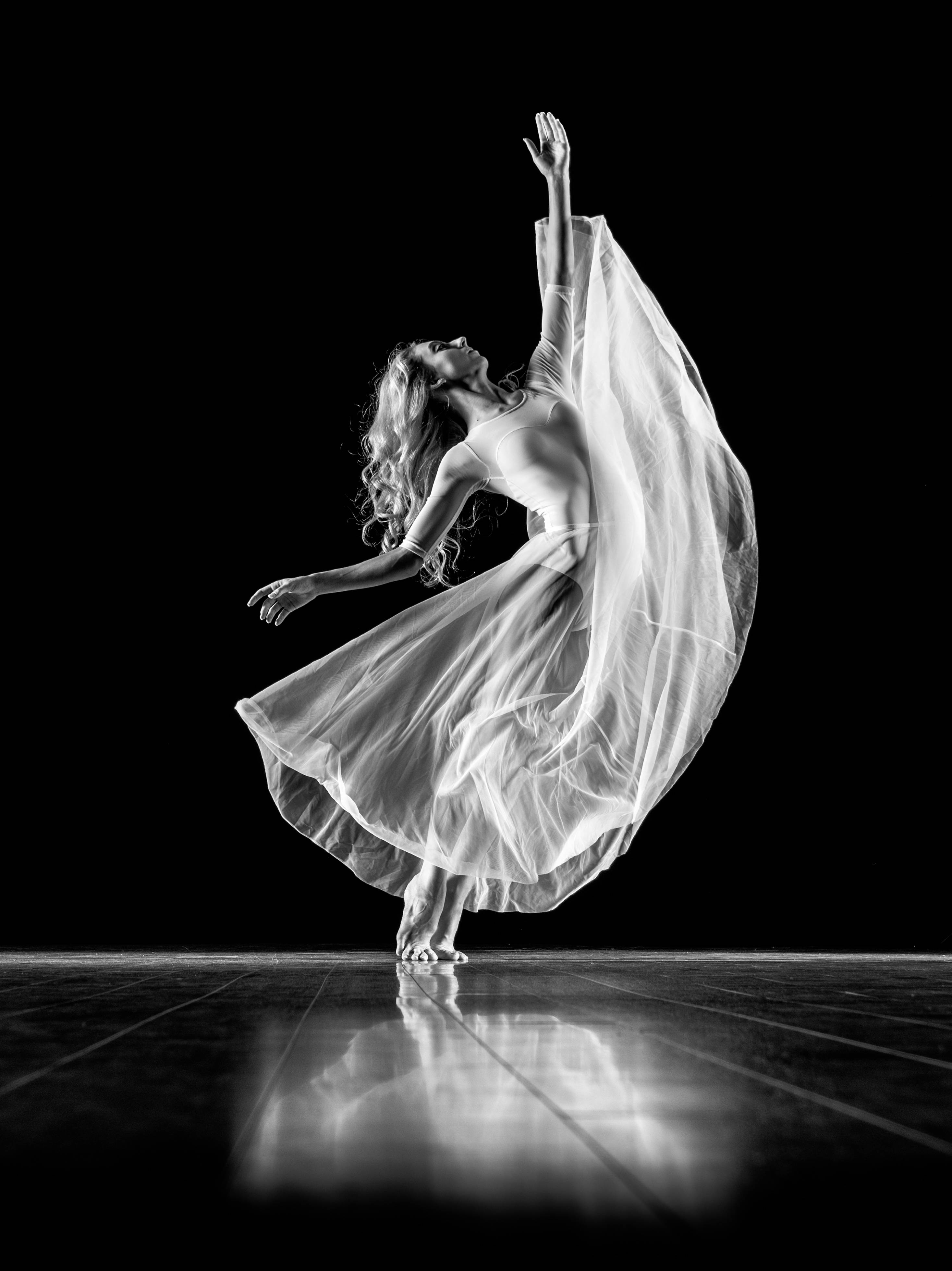 ballet dancer, flowing white dress, stark black background, 4K Phone Wallpaper