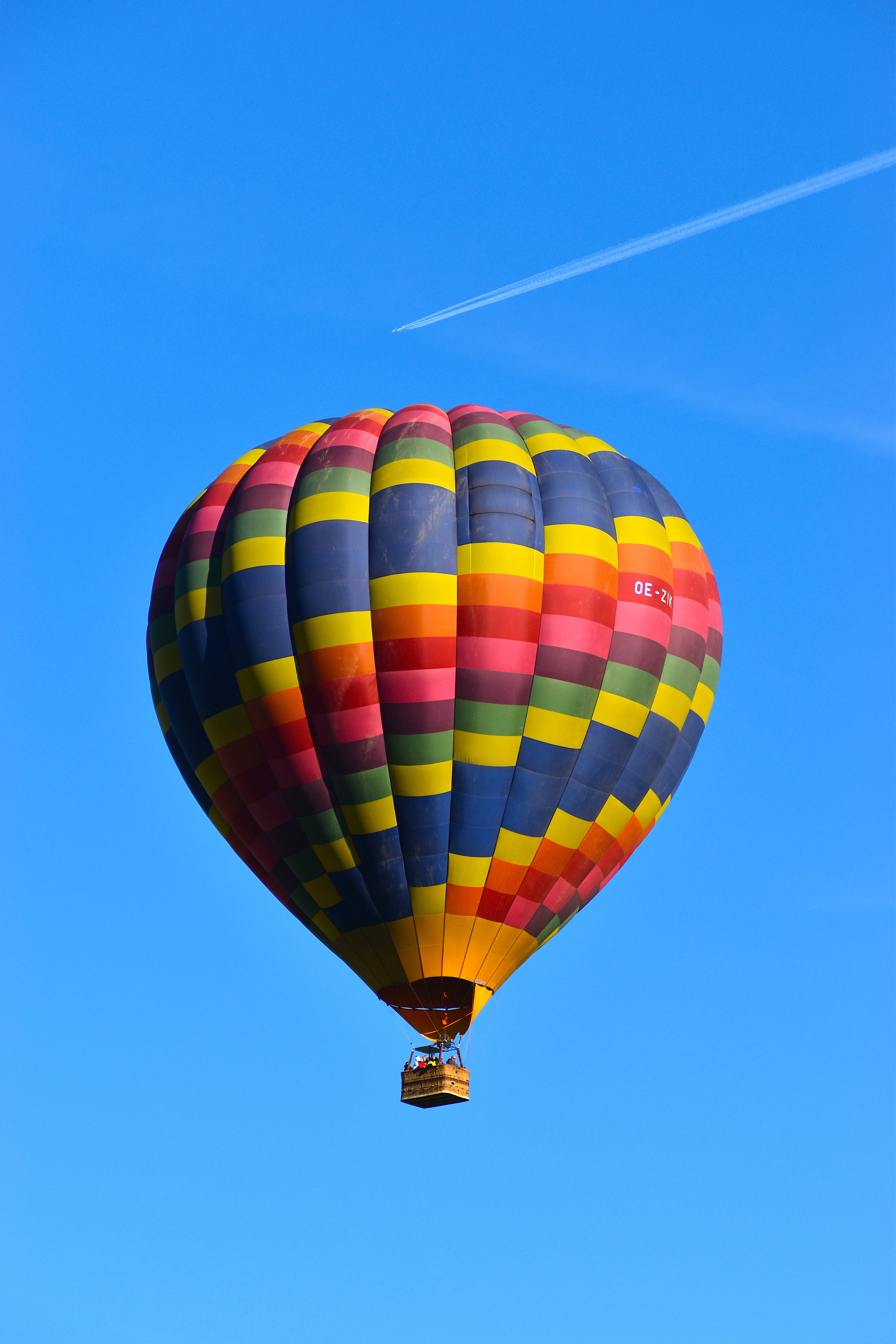 colorful hot air balloon, rainbow stripes, clear blue sky, 5K Phone Wallpaper