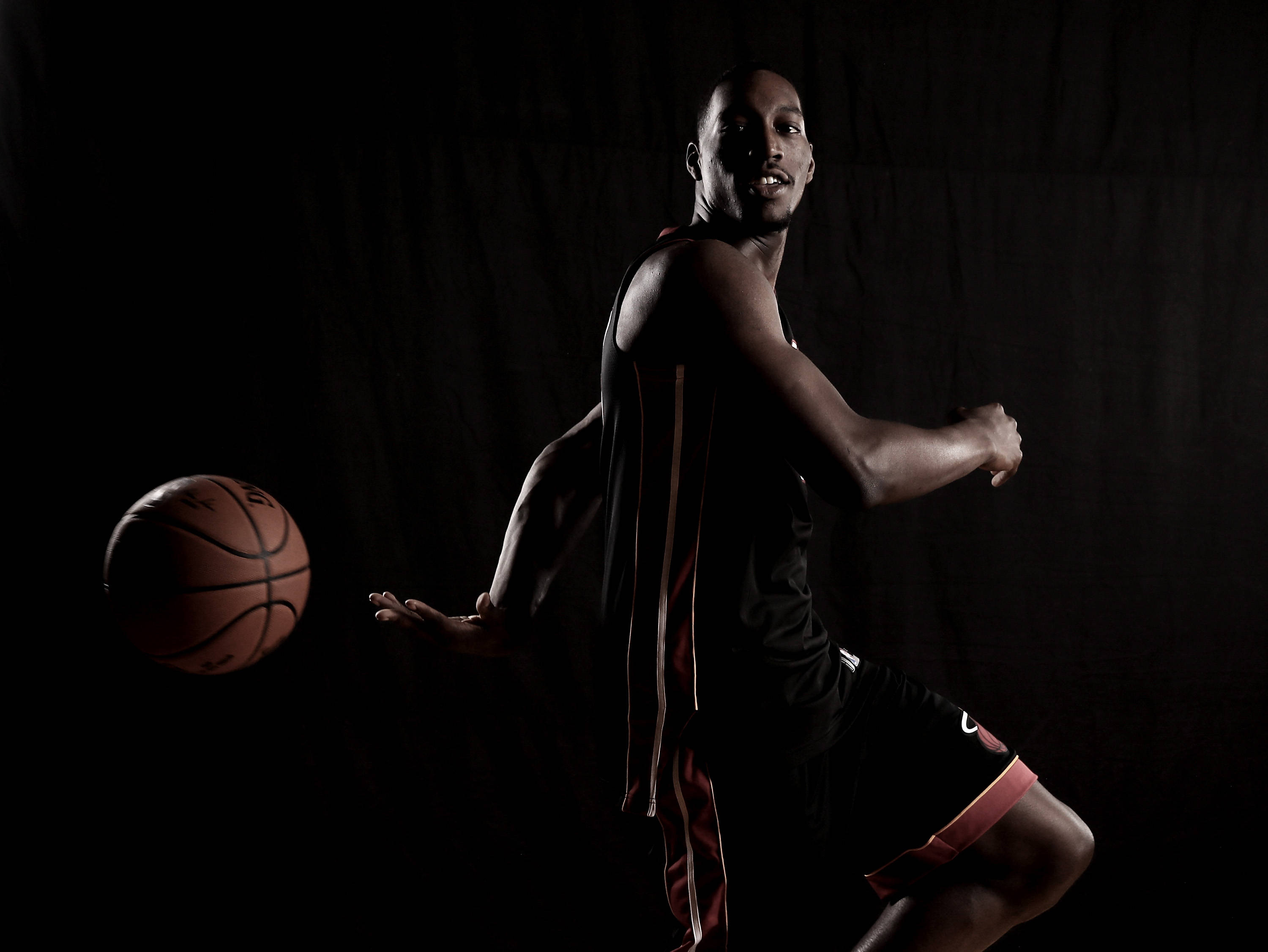 Bam Adebayo, black jersey, dribbles a ball, 2K Desktop Wallpaper