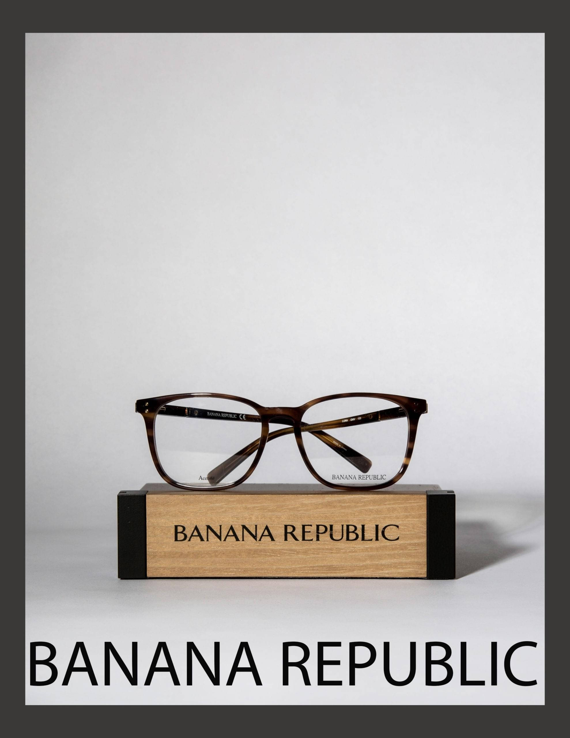 Banana Republic, tortoiseshell-framed glasses, branded wooden display block, 2K Phone Wallpaper