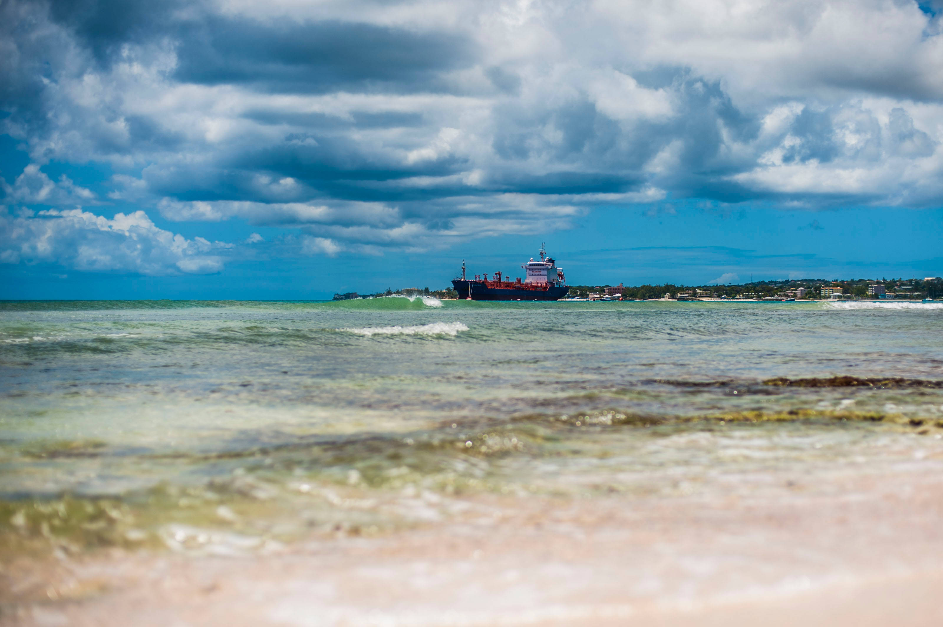 Barbados, red cargo ship, turquoise waters, 2K Desktop Wallpaper