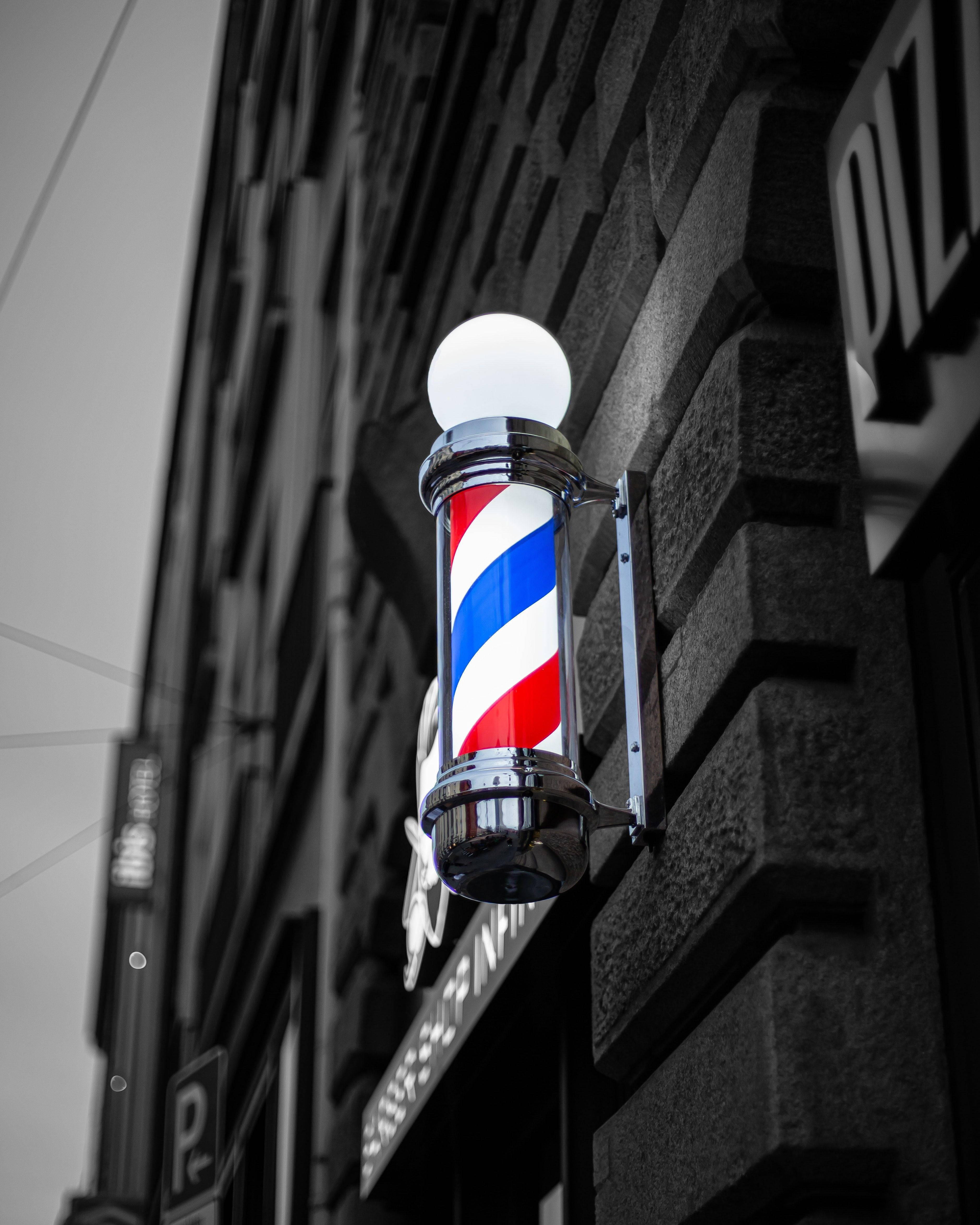 barber pole, red white and blue, monochrome brick building facade, 4K Phone Wallpaper
