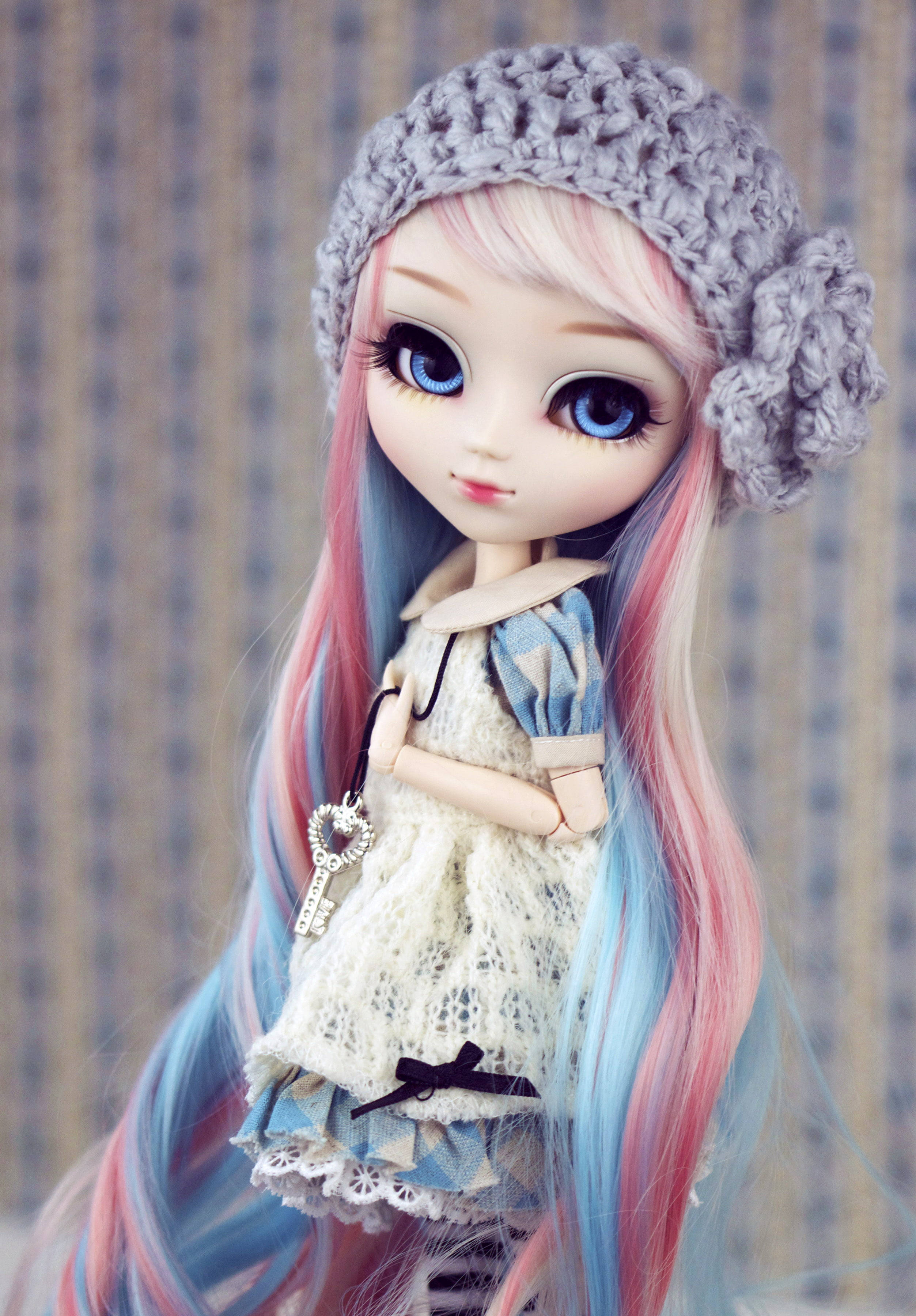 Barbie Doll, pastel pink and blue hair, gray knit hat, 2K Phone Wallpaper
