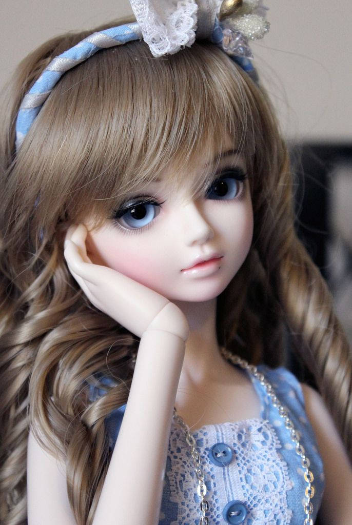 Barbie Doll, long wavy brown hair, blue eyes, SD Phone Wallpaper