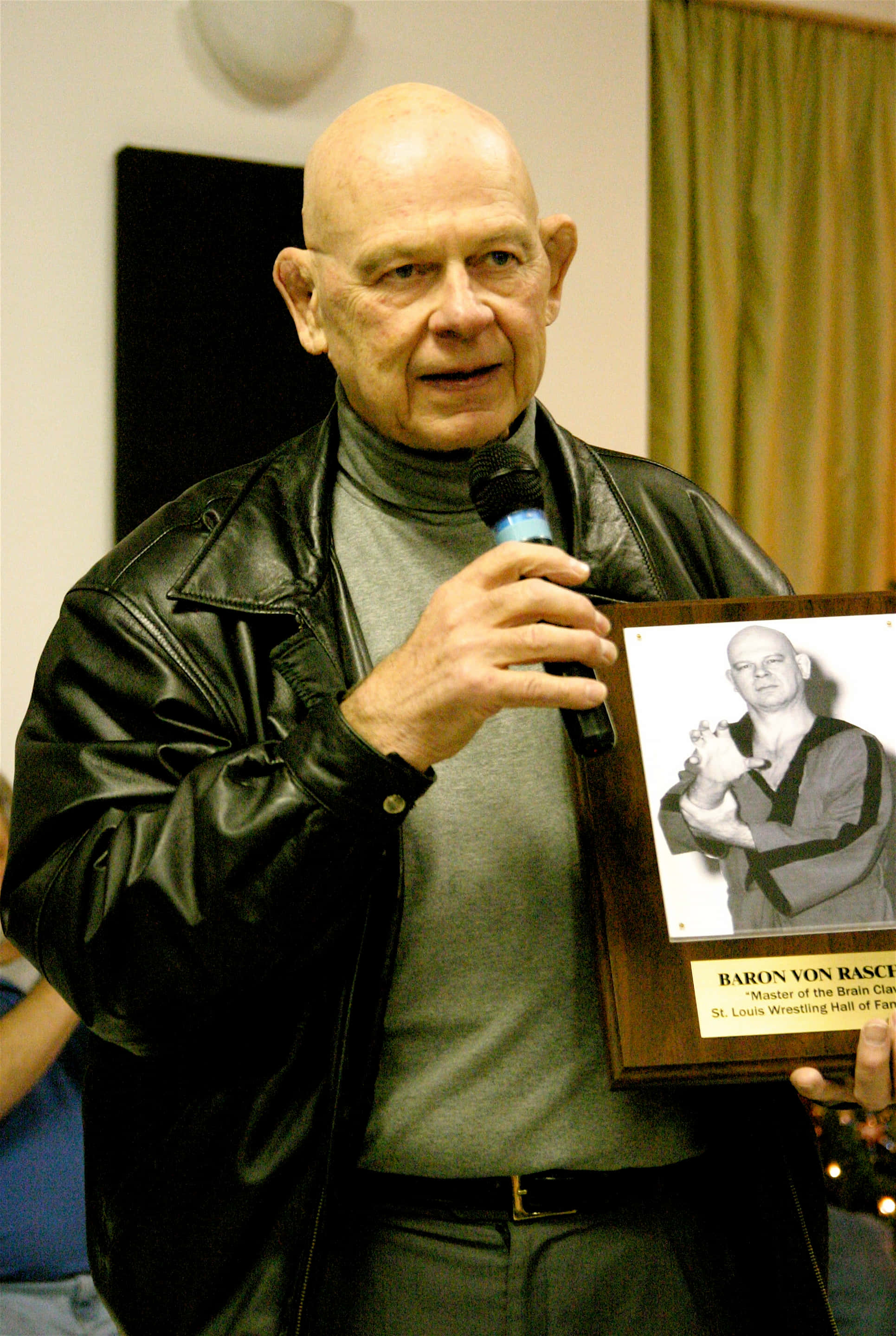 Baron Von Raschke, black leather jacket, microphone, 2K Phone Wallpaper