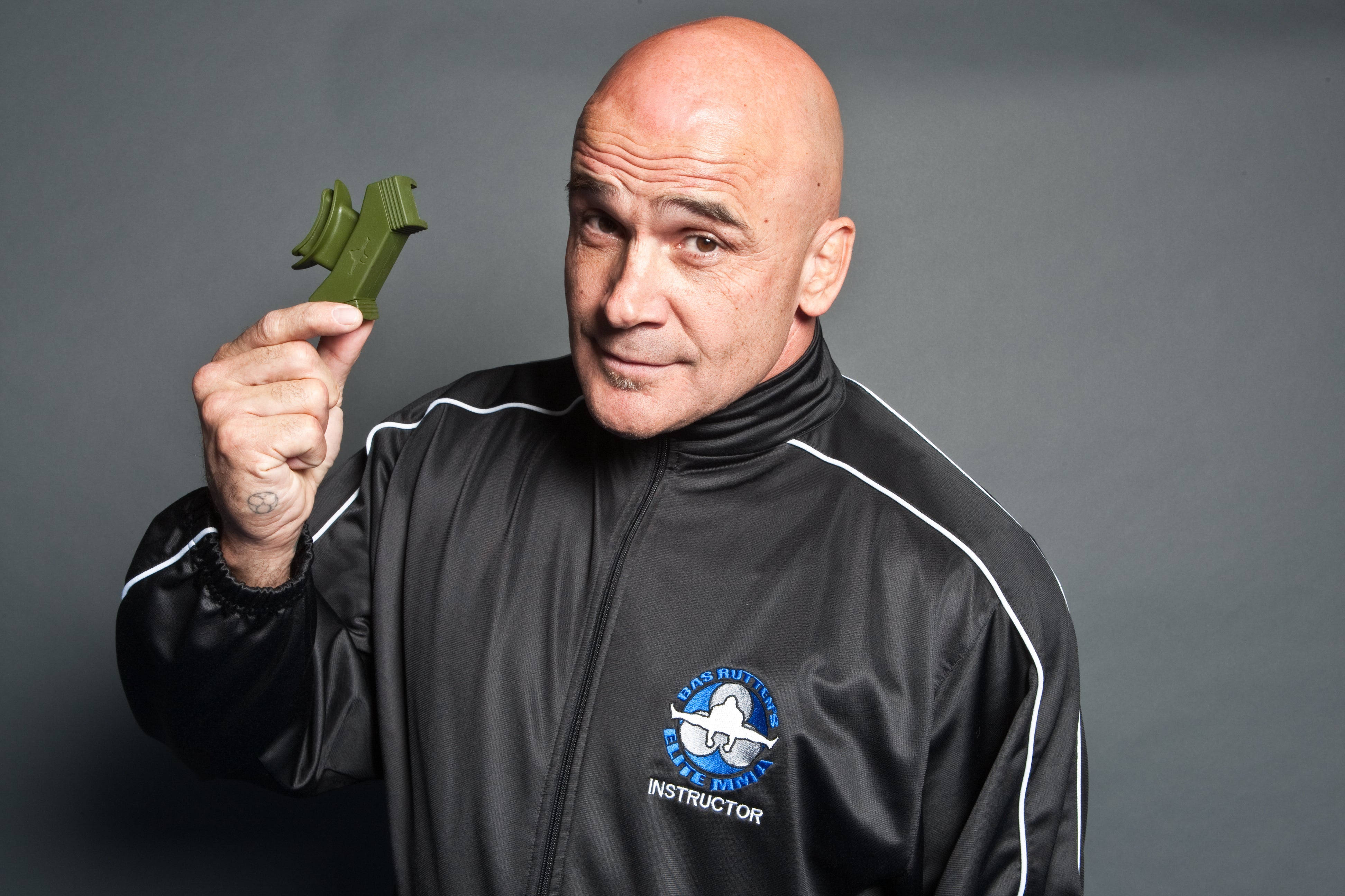 Bas Rutten, black instructor jacket, green training pistol, 4K Desktop Wallpaper