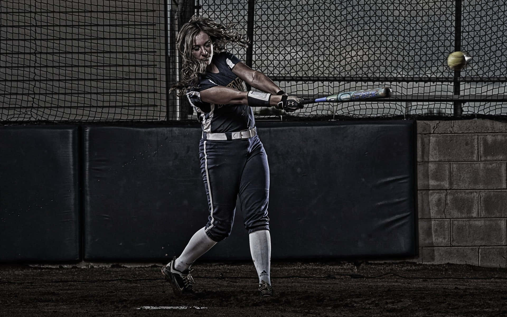 female softball player, bat, dimly lit indoor cage, Full HD Desktop Wallpaper