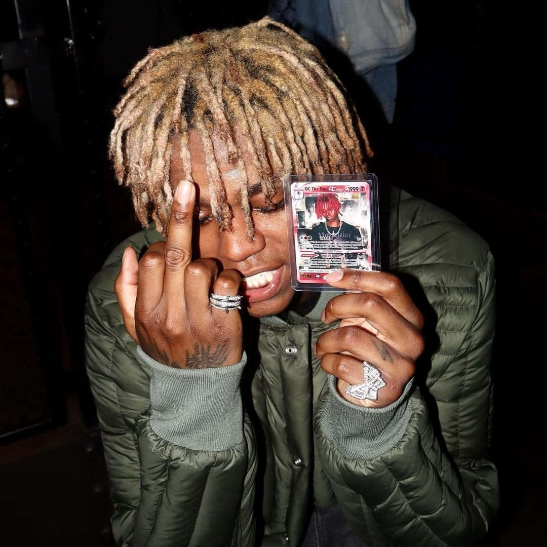 man, light brown dreadlocks, green puffer jacket, SD Desktop Wallpaper