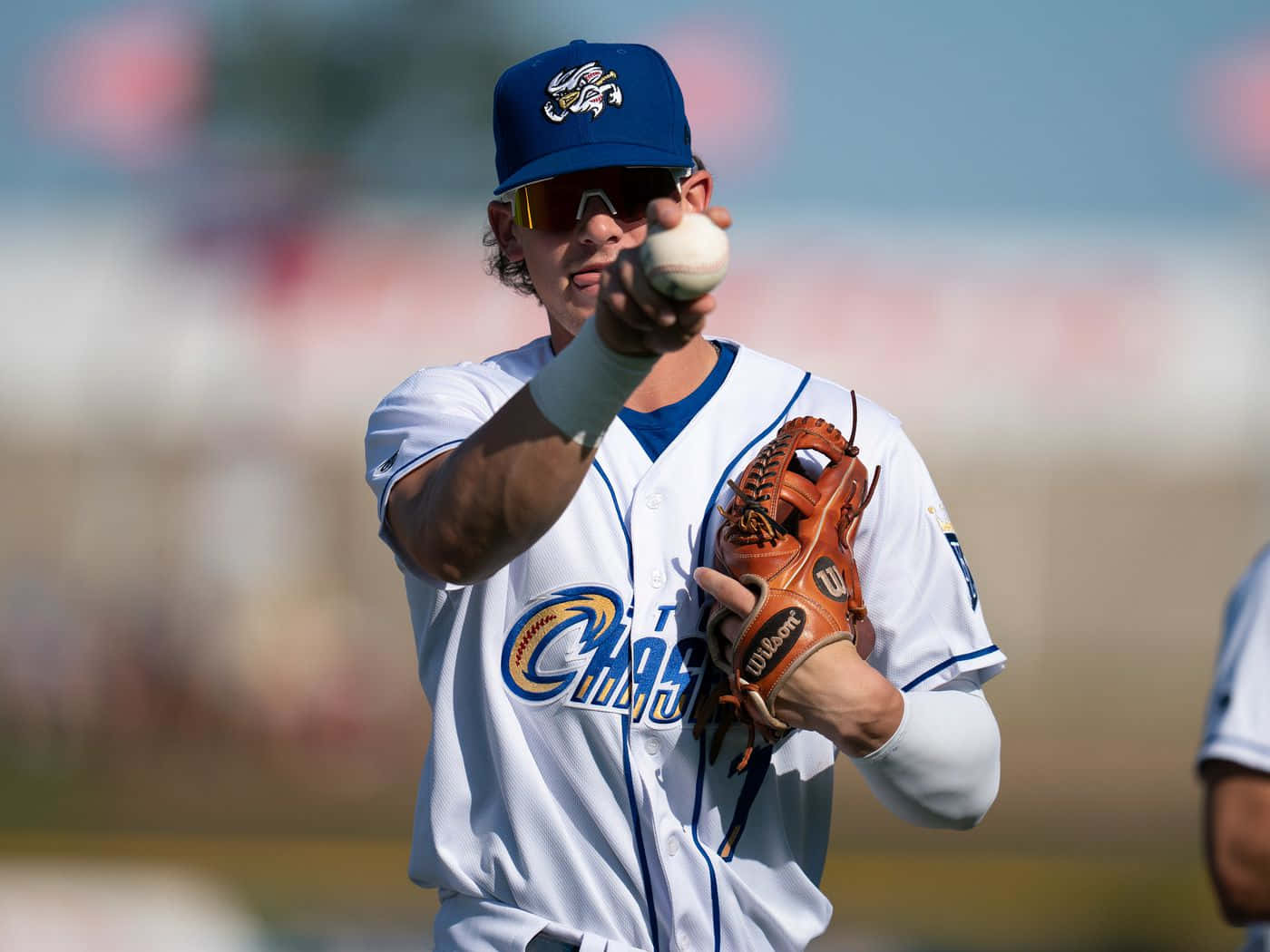 baseball pitcher, white and blue uniform, winds up to throw a pitch, HD Desktop Wallpaper