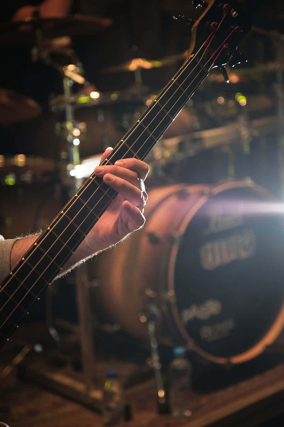 bass guitar, stage lights, drum set, HD Phone Wallpaper