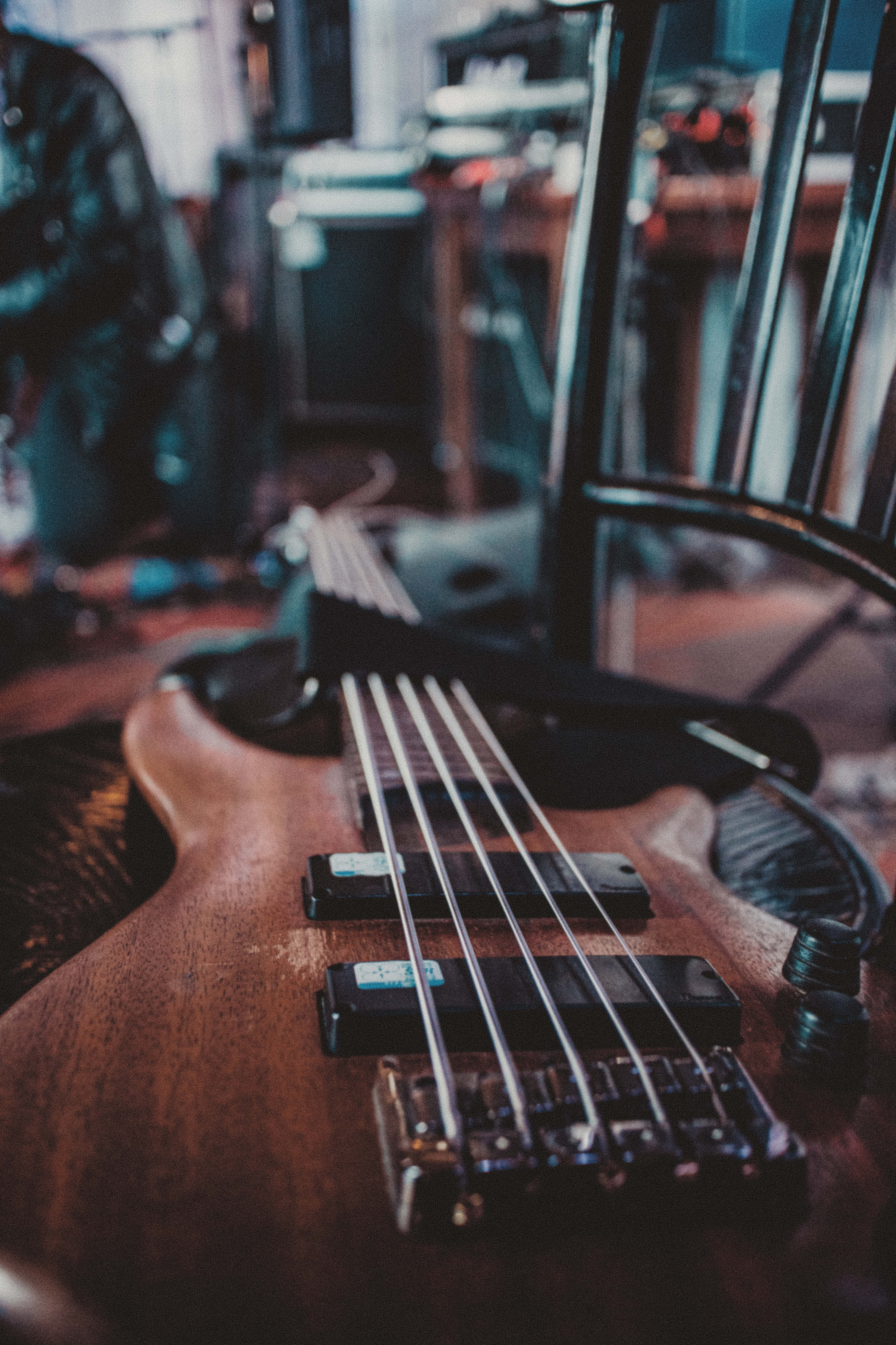 bass guitar, wooden, dimly lit music room, 5K Phone Wallpaper