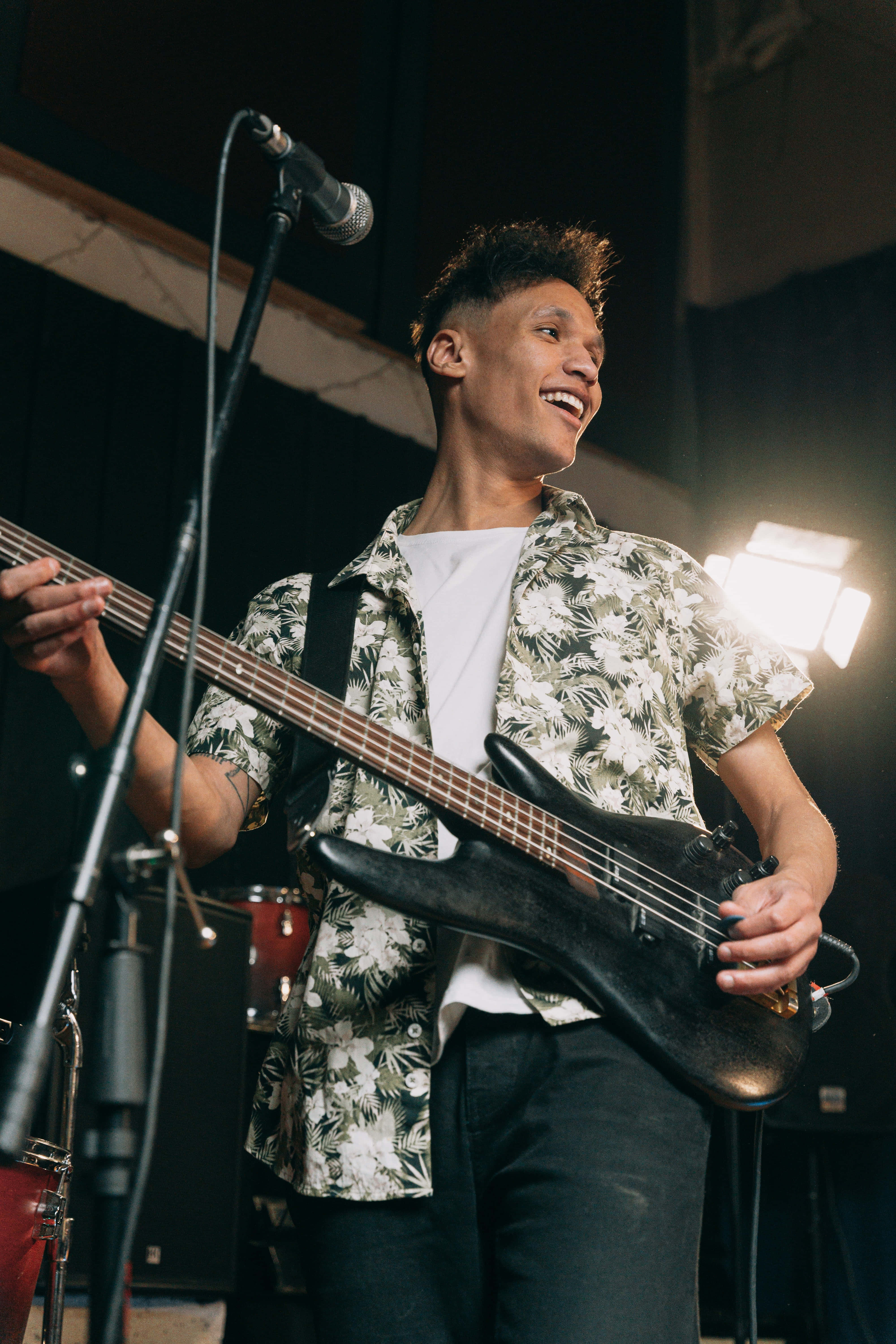 black bass guitar, recording studio, bright stage lights, 5K Phone Wallpaper