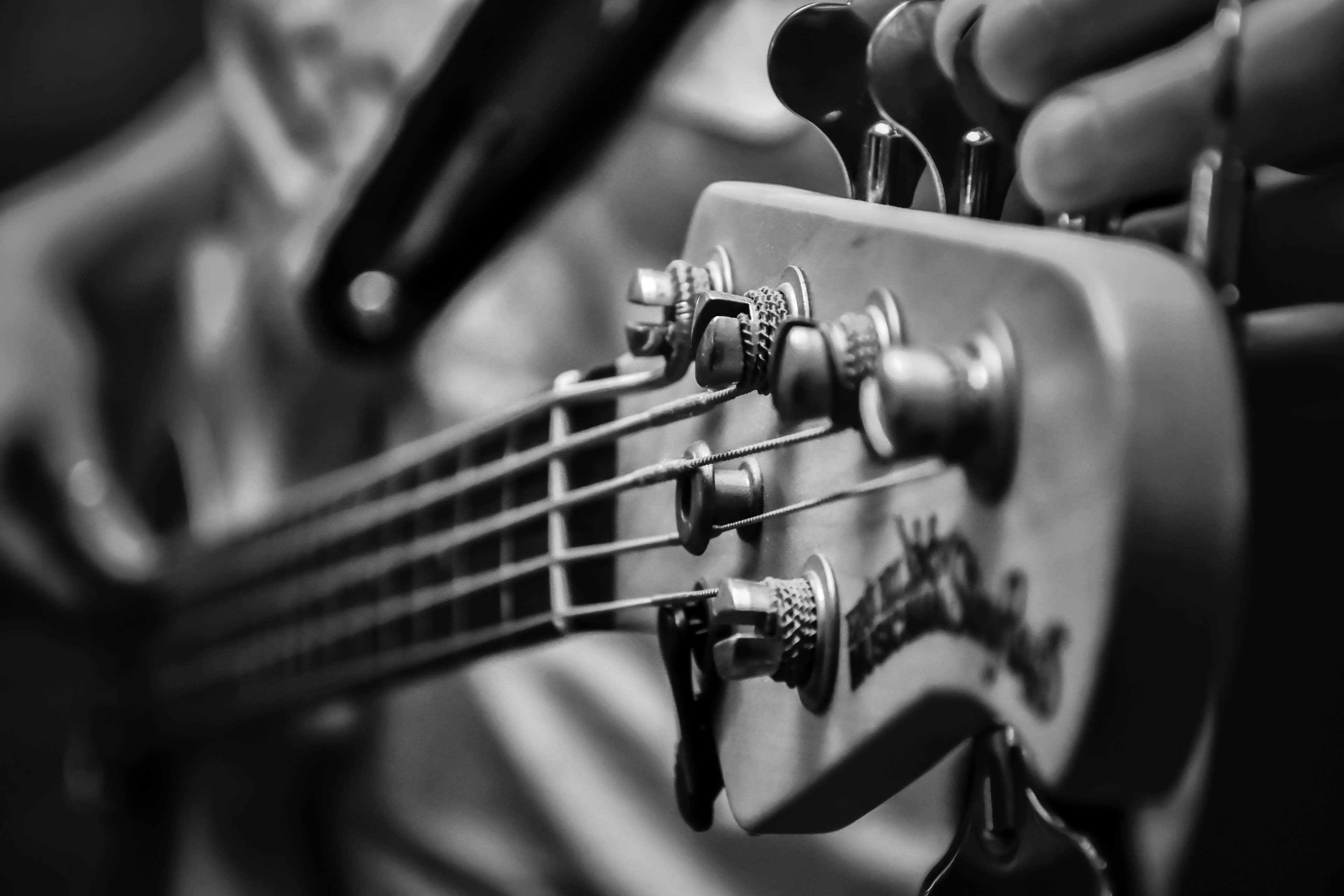 bass guitar, headstock, fingers, 4K Desktop Wallpaper