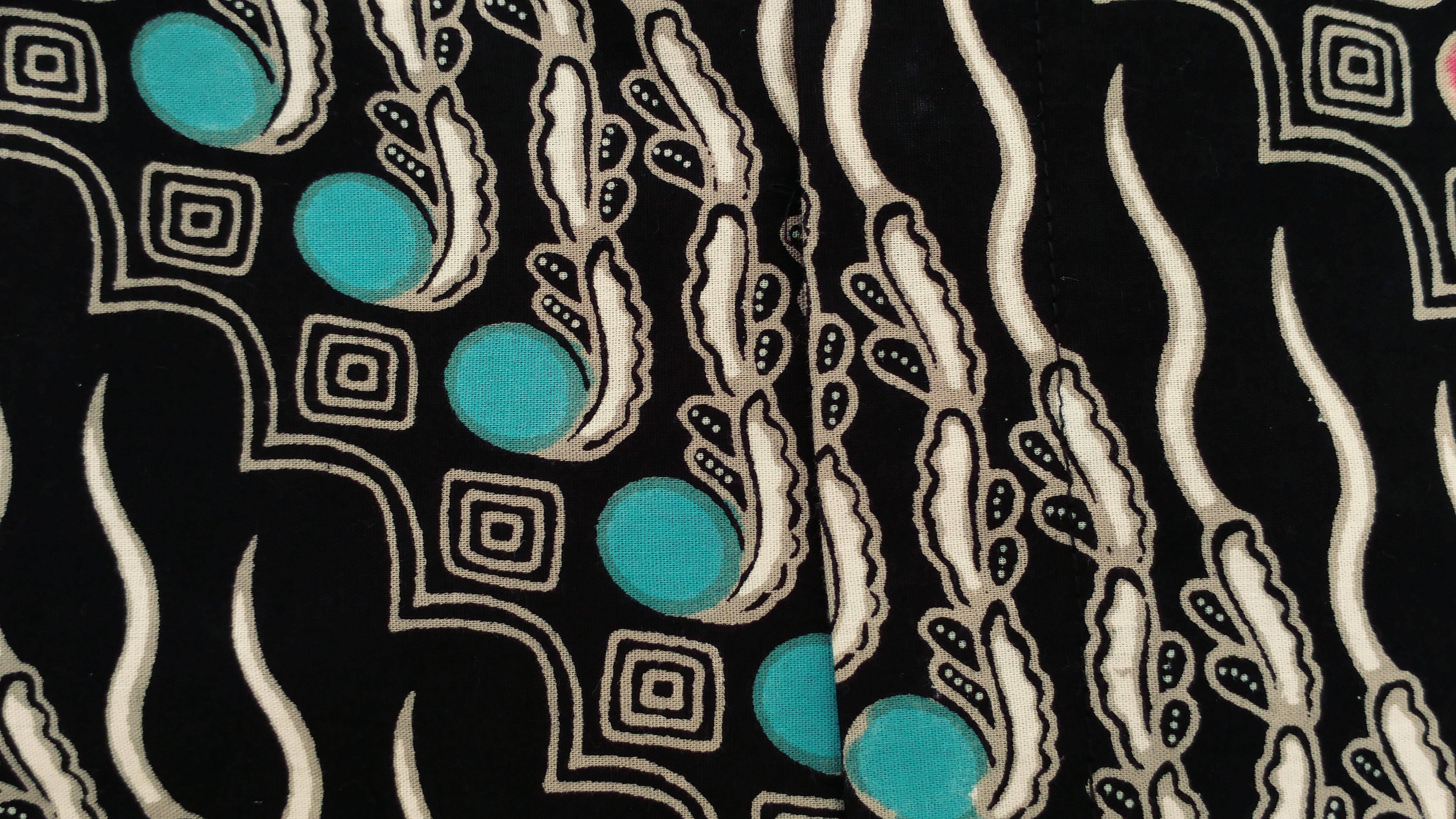 Batik, turquoise beads, black fabric, 5K Desktop Wallpaper