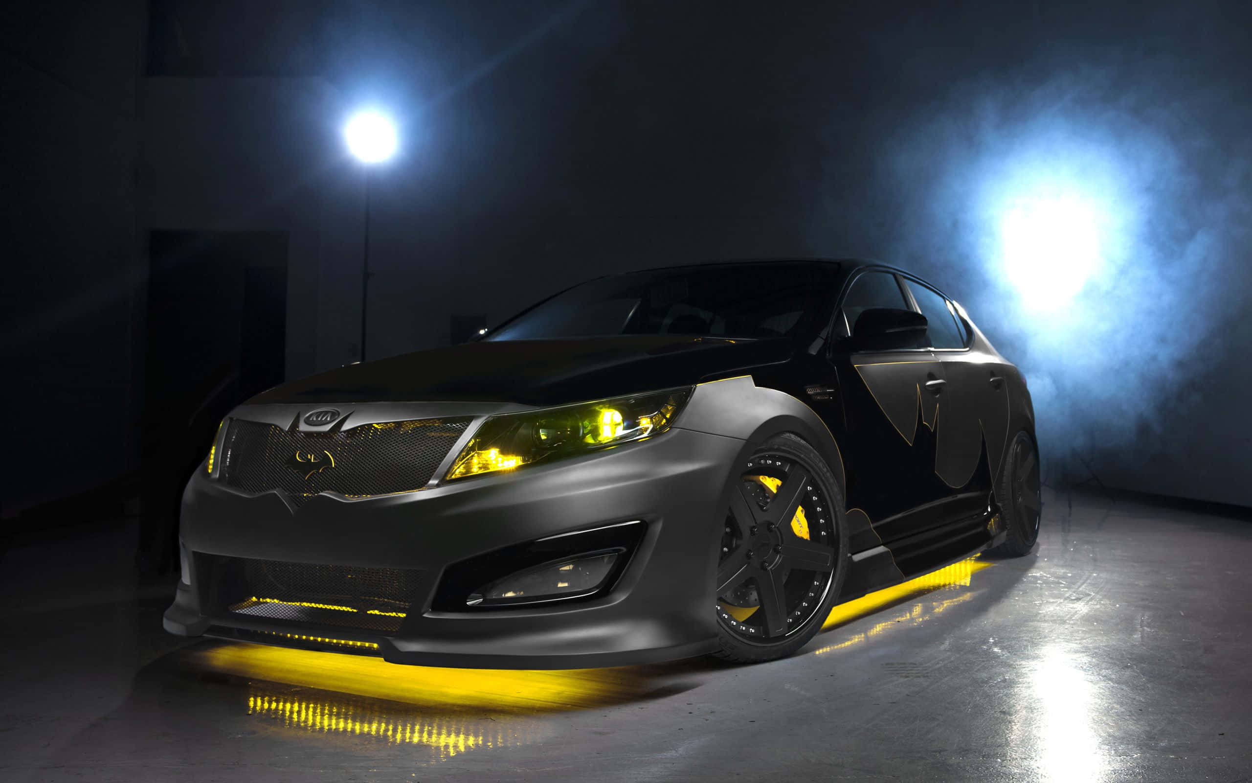 Batman Car, matte black, glowing yellow accents, 2K Desktop Wallpaper